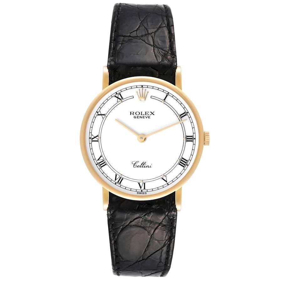 Rolex Cellini Classic 18K Yellow Gold White Roman Dial Mens Watch 5112. Manual winding movement. 18k yellow gold slim case 32.0 mm in diameter. . Scratch resistant sapphire crystal. Flat profile. White dial with printed black roman numerals. Custom