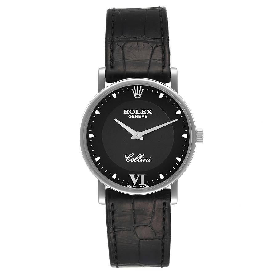 Rolex Cellini Classic 32mm White Gold Black Dial Mens Watch 5115. Manual winding movement. 18K white gold slim case 31.8 x 5.5 mm in diameter. Rolex logo on a crown. . Scratch resistant sapphire crystal. Flat profile. Black dial with dot hour