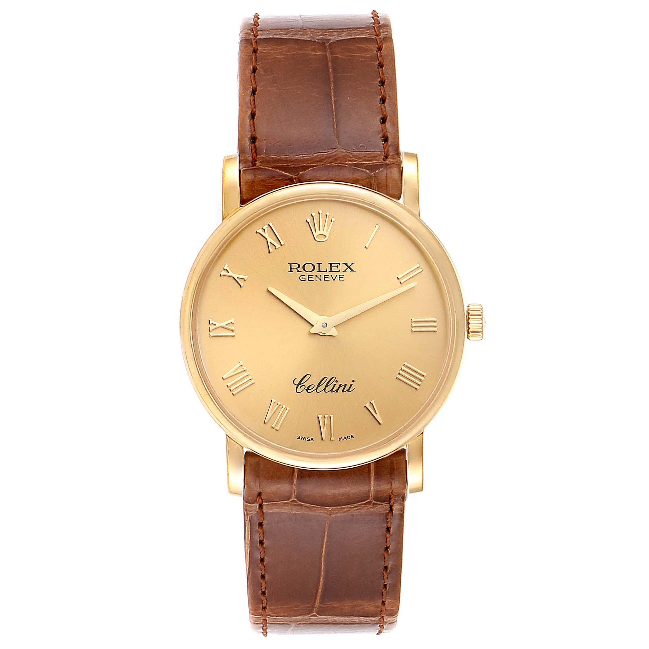 Rolex Cellini Classic 32mm Yellow Gold Brown Strap Mens Watch 5115. Manual winding movement. 18K yellow gold slim case 31.8 x 5.5 mm in diameter. Rolex logo on a crown. . Scratch resistant sapphire crystal. Flat profile. Champagne dial with raised