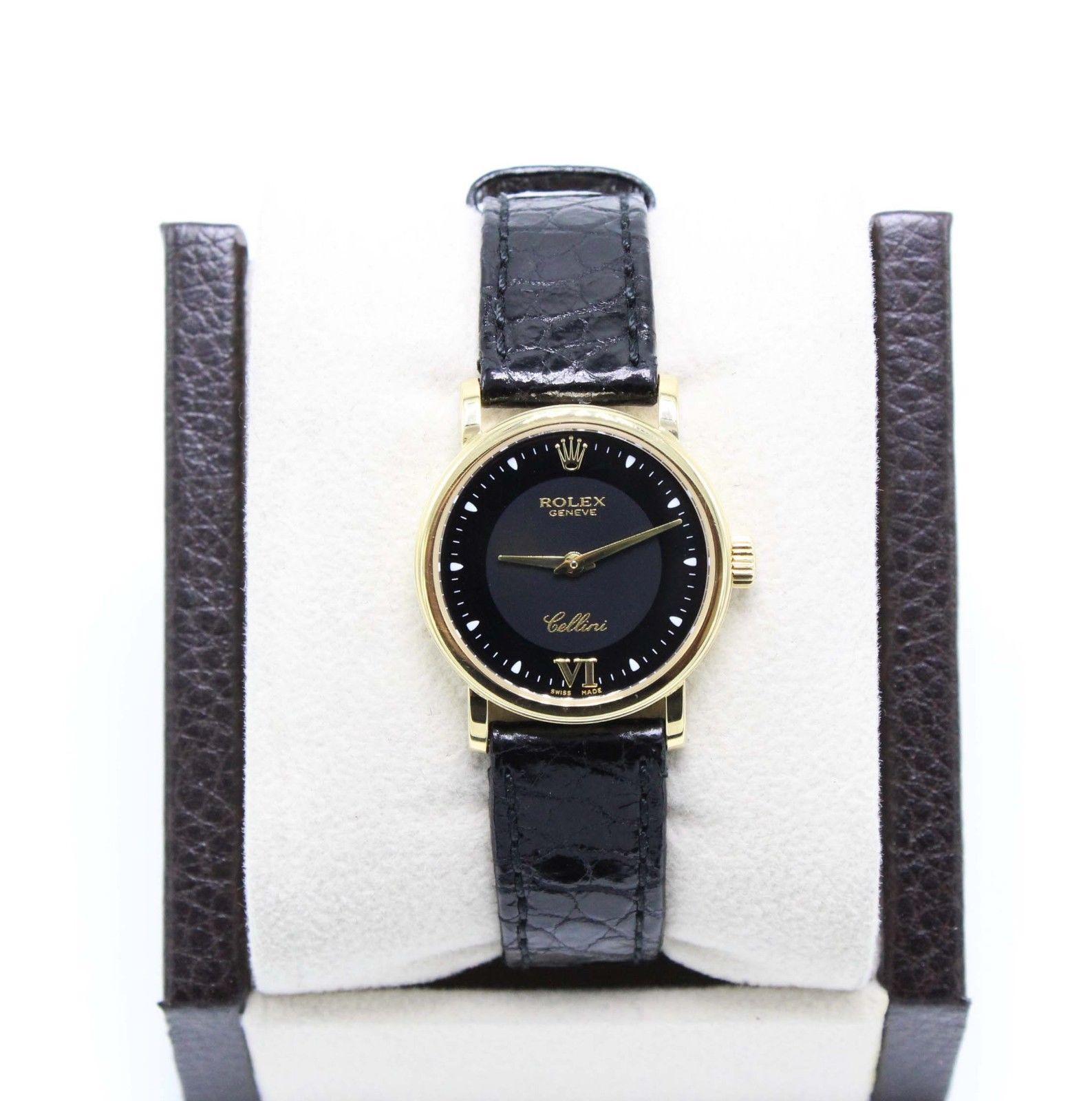 Style Number: 6110

Serial: A849***

Model: Cellini

Case Material: 18K Yellow Gold

Band: Leather 

Bezel: 18K Yellow Gold

Dial: Black

Face: Sapphire Crystal

Case Size: 25mm

Includes: 

-Elegant Watch Box

-Certified Appraisal 

-6 Month