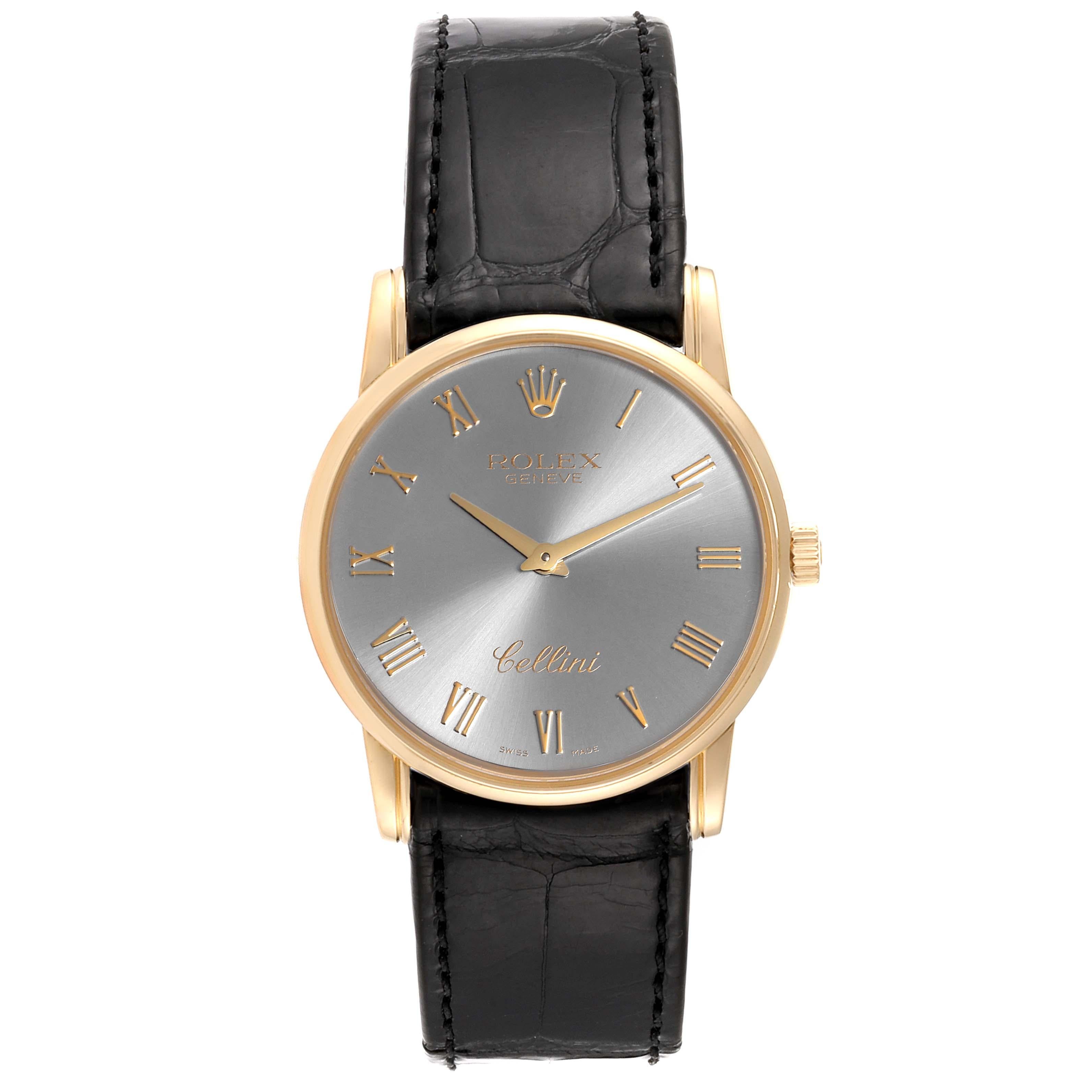 Rolex Cellini Classic Slate Dial 18k Gold Mens Watch 5116. Manually wind movement. 18k yellow gold slim case 31.8 x 5.5 mm in diameter. Rolex logo on a crown. . Scratch resistant sapphire crystal. Flat profile. Slate dial with raised gold roman