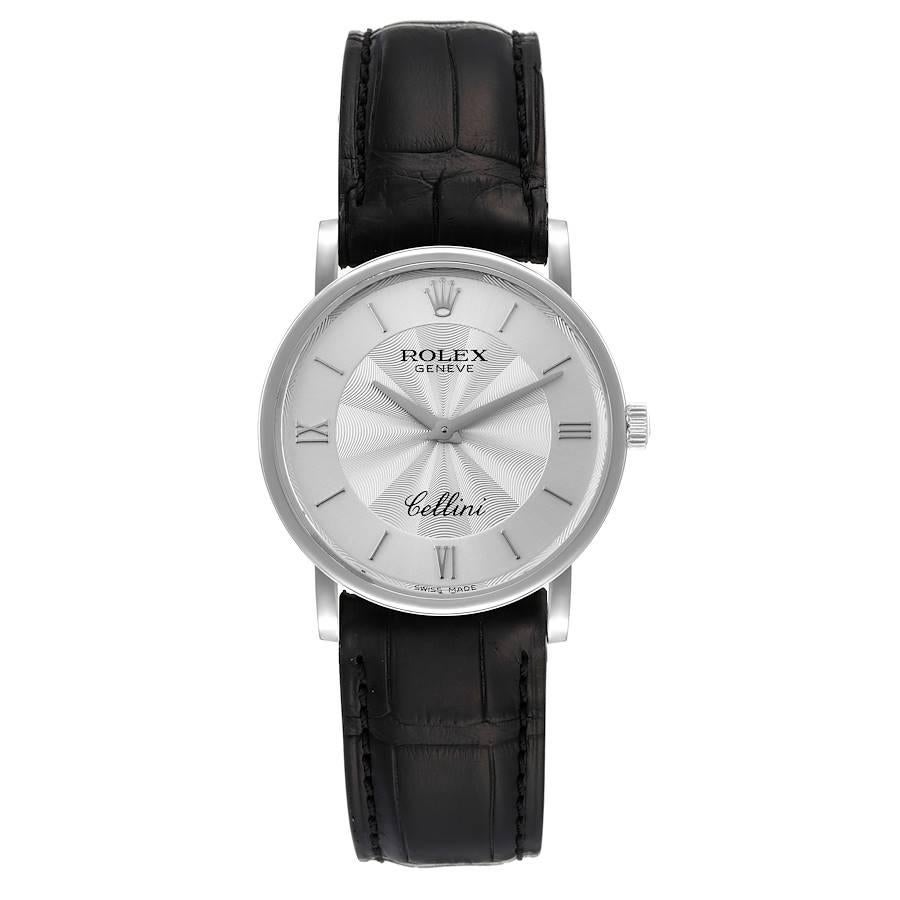 Rolex Cellini Classic Weißgold verziert Silber Zifferblatt Herrenuhr 5115 Box-Karte. Uhrwerk mit Handaufzug. Schlankes Gehäuse aus 18 Karat Weißgold mit einem Durchmesser von 32 mm. 5,5 mm Gehäusedicke. Rolex Logo auf der Krone. . Kratzfestes