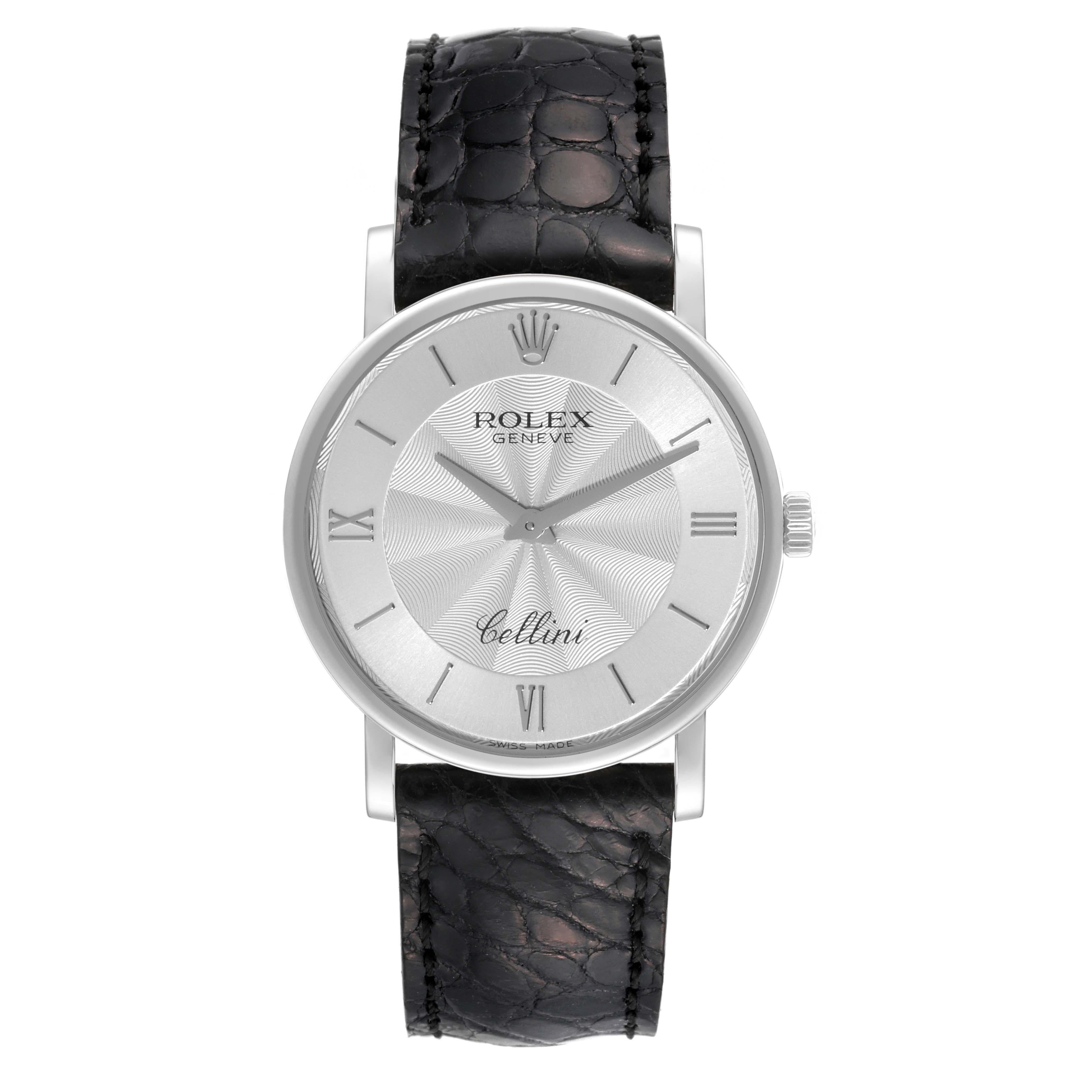 Rolex Cellini Classic White Gold Decorated Silver Dial Mens Watch 5115 Box Card. Manual winding movement. 18K white gold slim case 32 mm in diameter. 5.5 mm case thickness. Rolex logo on the crown. . Scratch resistant sapphire crystal. Flat profile.