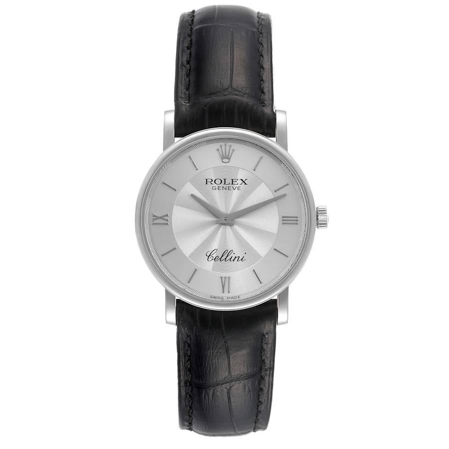 Rolex Cellini Classic White Gold Decorated Silver Dial Mens Watch 5115 Card. Manual winding movement. 18K white gold slim case 32 mm in diameter. 5.5 mm case thickness. Rolex logo on the crown. . Scratch resistant sapphire crystal. Flat profile.