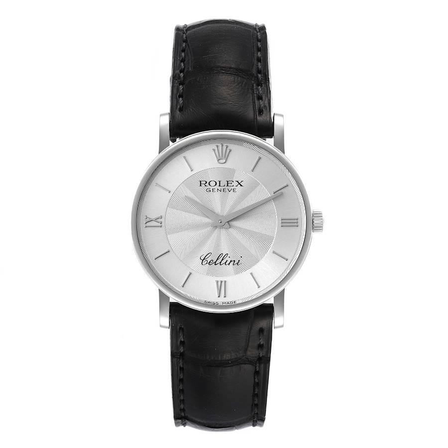 Rolex Cellini Classic White Gold Decorated Silver Dial Mens Watch 5115. Manual winding movement. 18K white gold slim case 31.8 mm in diameter. 5.5 mm case thickness. Rolex logo on the crown. . Scratch resistant sapphire crystal. Flat profile. Silver