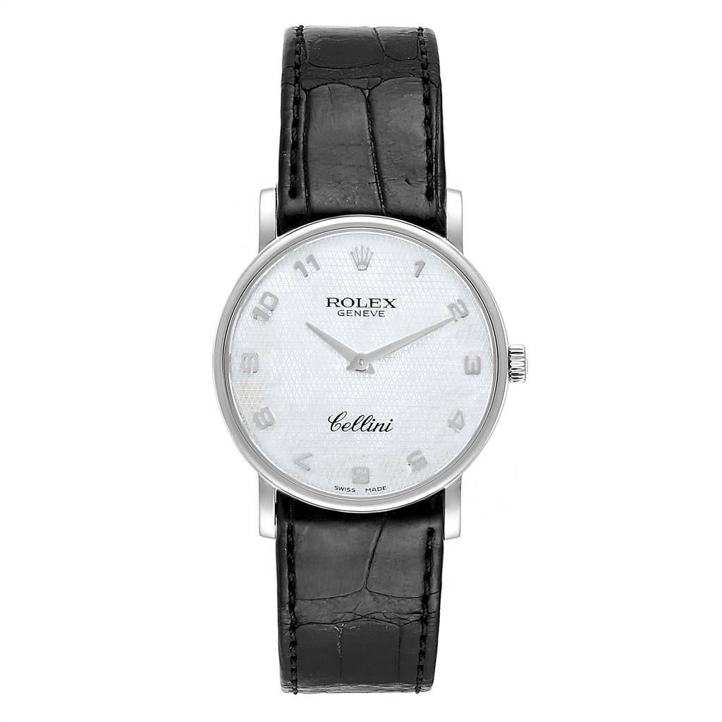 Rolex Cellini Classic White Gold MOP Dial Black Strap Mens Watch 5115. Manual winding movement. 18K white gold slim case 31.8 x 5.5 mm in diameter. Rolex logo on a crown. Scratch resistant sapphire crystal. Flat profile. Textured mother of pearl