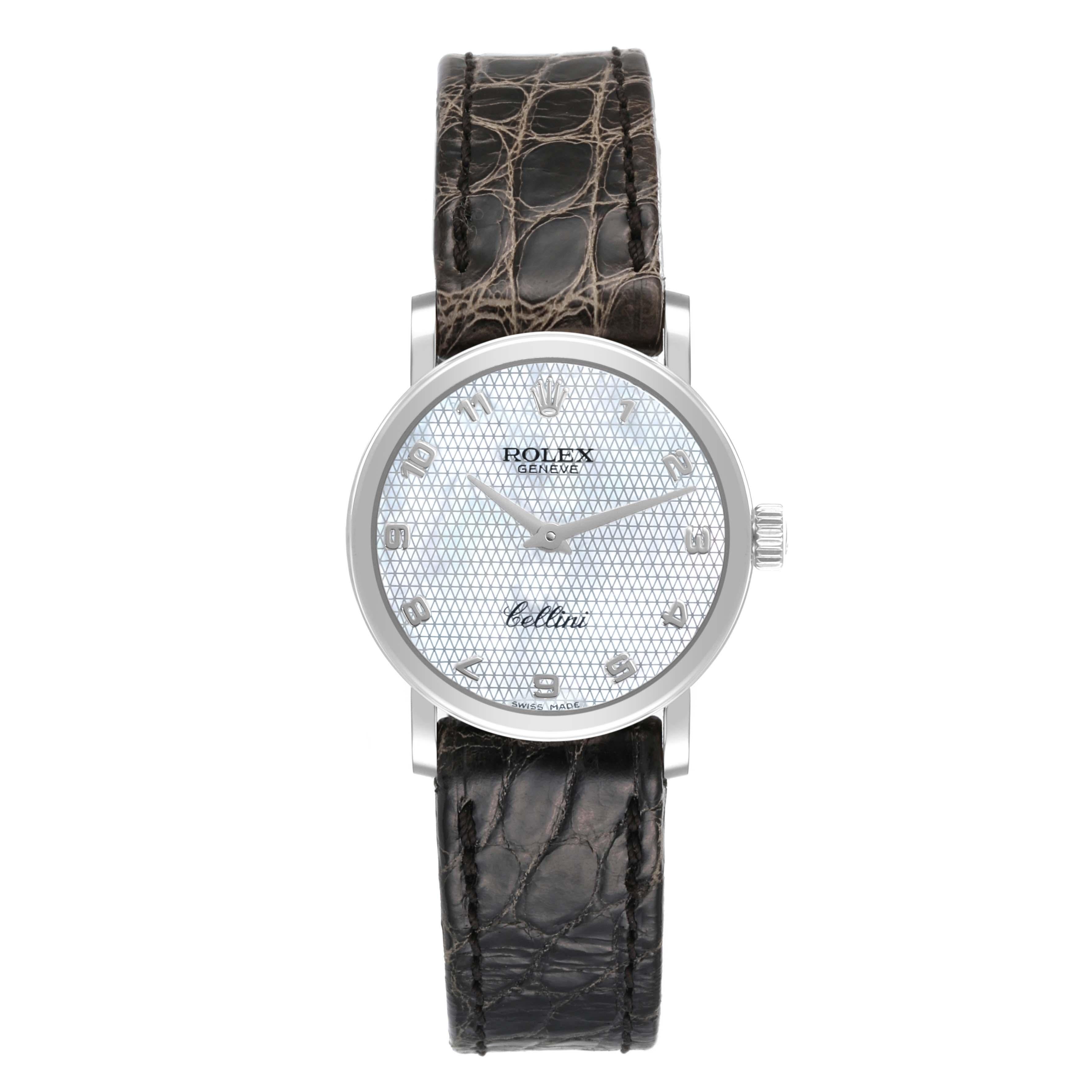 Rolex Cellini Classic White Gold Mother Of Pearl Dial Ladies Watch 6110 Unworn. Quartz movement. 18k white gold slim case 26.0 mm in diameter. . Scratch resistant sapphire crystal. Flat profile. Textured mother of pearl dial with raised Arabic