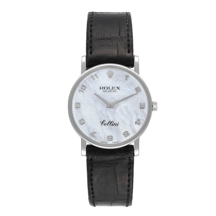 Rolex Cellini Classic White Gold Mother of Pearl Dial Mens Watch 5115. Manual winding movement. 18K white gold slim case 32 mm in diameter. Case thickness: 5.5 mm. Rolex logo on the crown. . Scratch resistant sapphire crystal. Flat profile. Textured