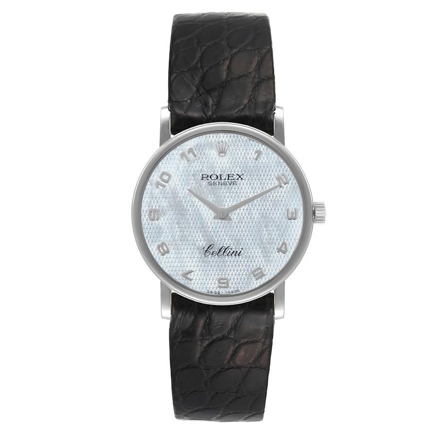 Rolex Cellini Classic White Gold Mother of Pearl Dial Mens Watch 5115. Manual winding movement. 18K white gold slim case 32 mm in diameter. Case thickness: 5.5 mm. Rolex logo on the crown. . Scratch resistant sapphire crystal. Flat profile. Textured