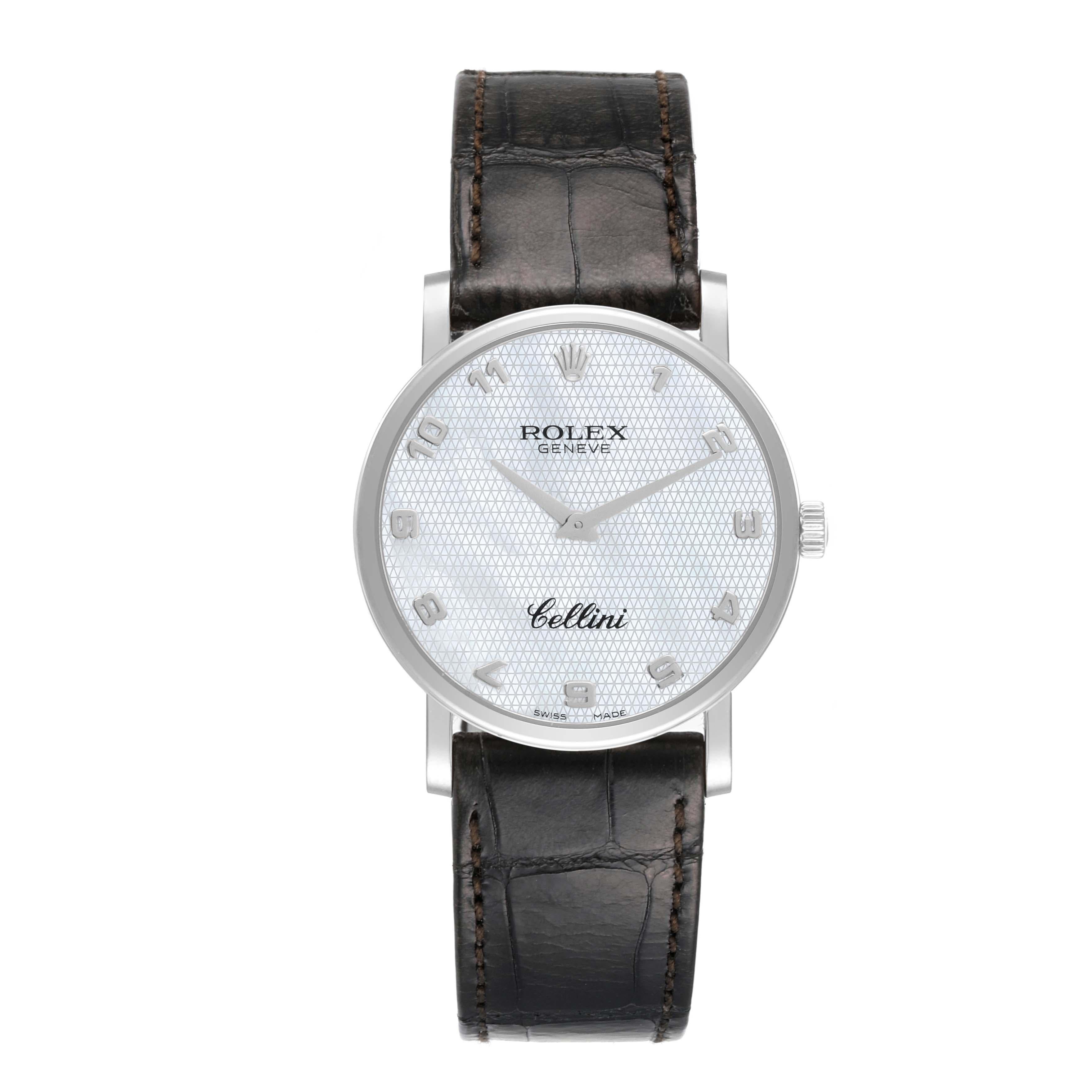 Rolex Cellini Classic White Gold Mother Of Pearl Dial Mens Watch 5115 Unworn. Manual winding movement. 18k white gold slim case 31.8 x 5.5 mm in diameter. Rolex logo on the crown. . Scratch resistant sapphire crystal. Flat profile. Textured mother