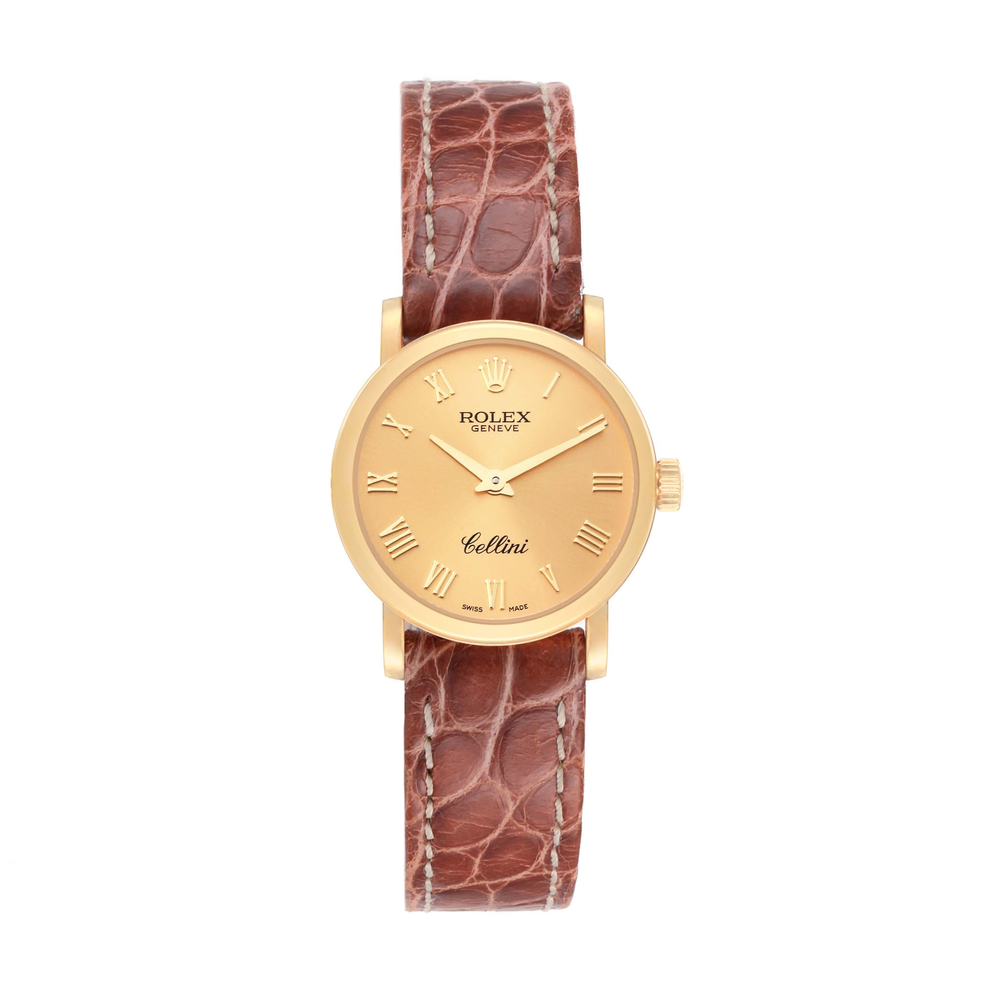 Rolex Cellini Classic Yellow Gold Brown Strap Ladies Watch 6110 Unworn. Quartz movement. 18k yellow gold slim case 26.0 mm in diameter. . Scratch resistant sapphire crystal. Flat profile. Champagne dial with raised yellow gold Roman numerals. Brown