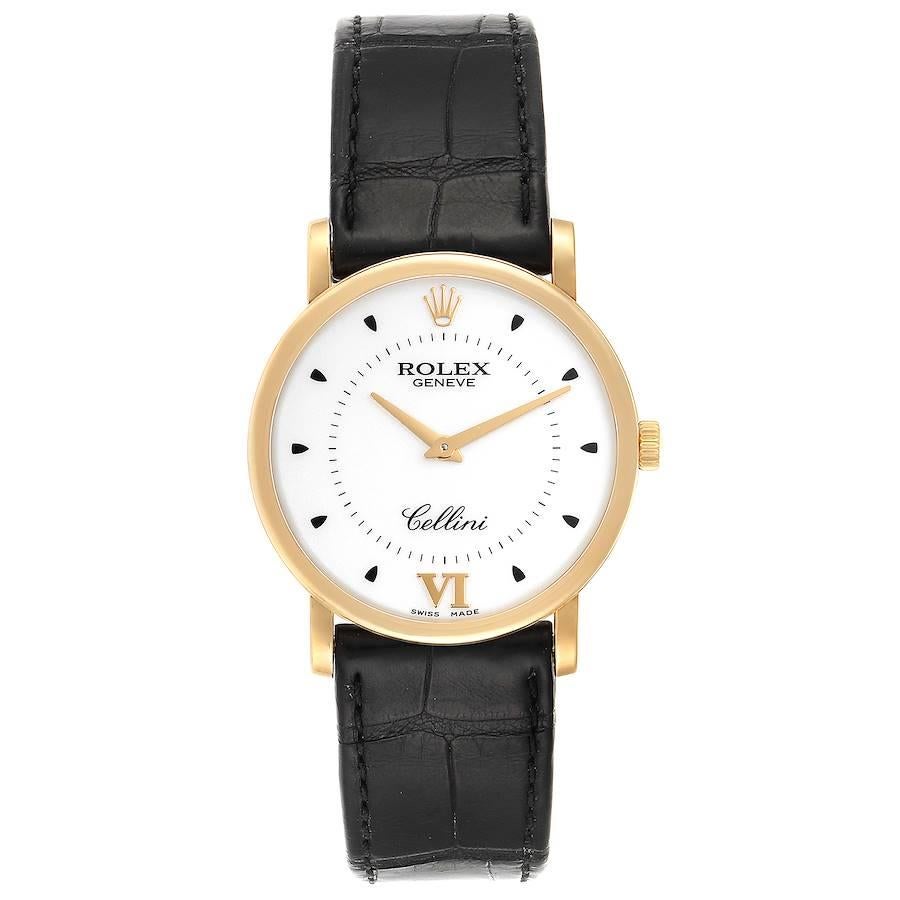 Rolex Cellini Classic Yellow Gold Brown Strap Mens Watch 5115 Box Card. Manual winding movement. 18K yellow gold slim case 31.8 x 5.5 mm in diameter. Rolex logo on a crown. . Scratch resistant sapphire crystal. Flat profile. Silver dial with black