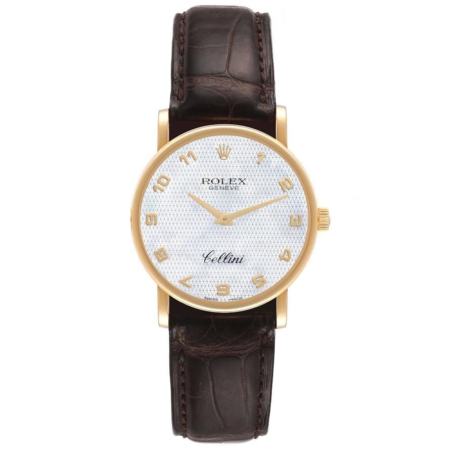 Rolex Cellini Classic Yellow Gold MOP Dial Brown Strap Watch 5115. Manual winding movement. 18K yellow gold slim case 31.8 x 5.5 mm in diameter. Rolex logo on a crown. . Scratch resistant sapphire crystal. Flat profile. Textured mother of pearl dial