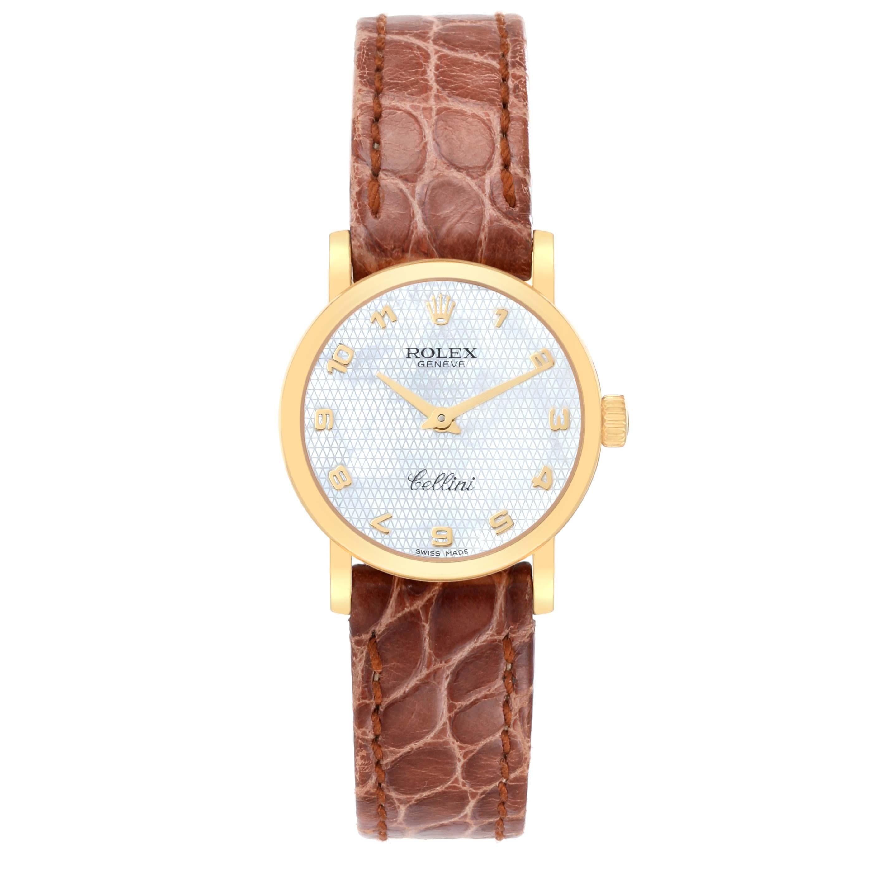 Rolex Cellini Classic Yellow Gold Mother Of Pearl Dial Ladies Watch 6110 Unworn. Quartz movement. 18k yellow gold slim case 26.0 mm in diameter. . Scratch resistant sapphire crystal. Flat profile. Mother of Pearl dial with raised Arabic numeral hour