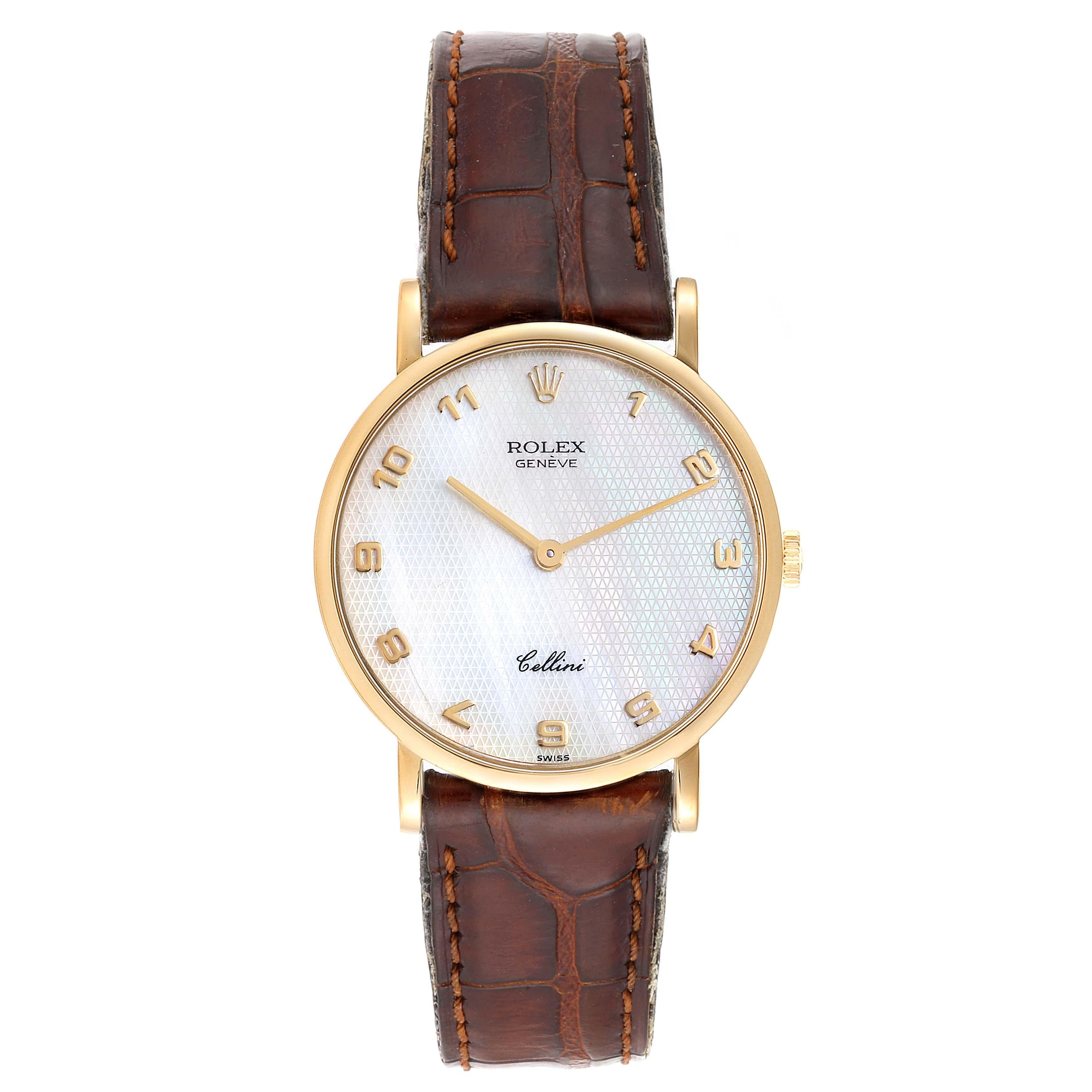 Rolex Cellini Classic Yellow Gold Mother Of Pearl Unisex Watch 5112. Manual winding movement. 18k yellow gold slim case 32.0 mm in diameter. . Scratch resistant sapphire crystal. Flat profile. Textured mother of pearl dial with raised gold arabic