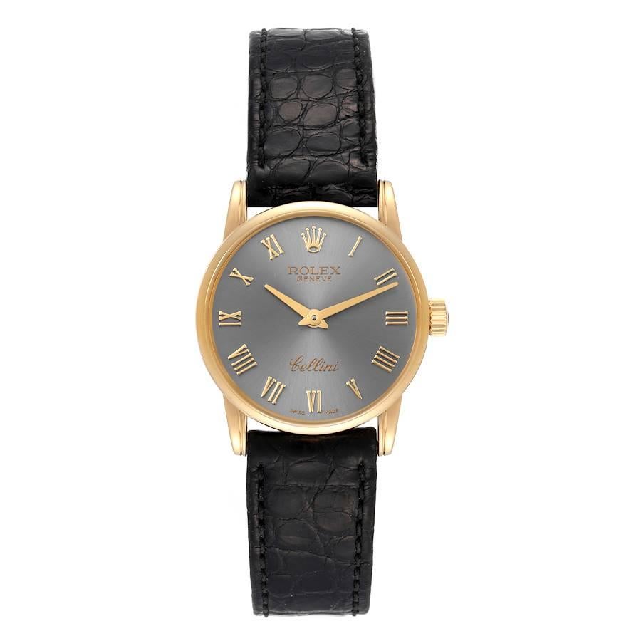 Rolex Cellini Classic Gelbgold Schiefer Zifferblatt Damenuhr 6111. Quarzwerk. Schlankes Gehäuse aus 18k Gelbgold mit einem Durchmesser von 26,0 mm. . Kratzfestes Saphirglas. Flaches Profil. Schieferfarbenes Zifferblatt mit aufgesetzten goldenen
