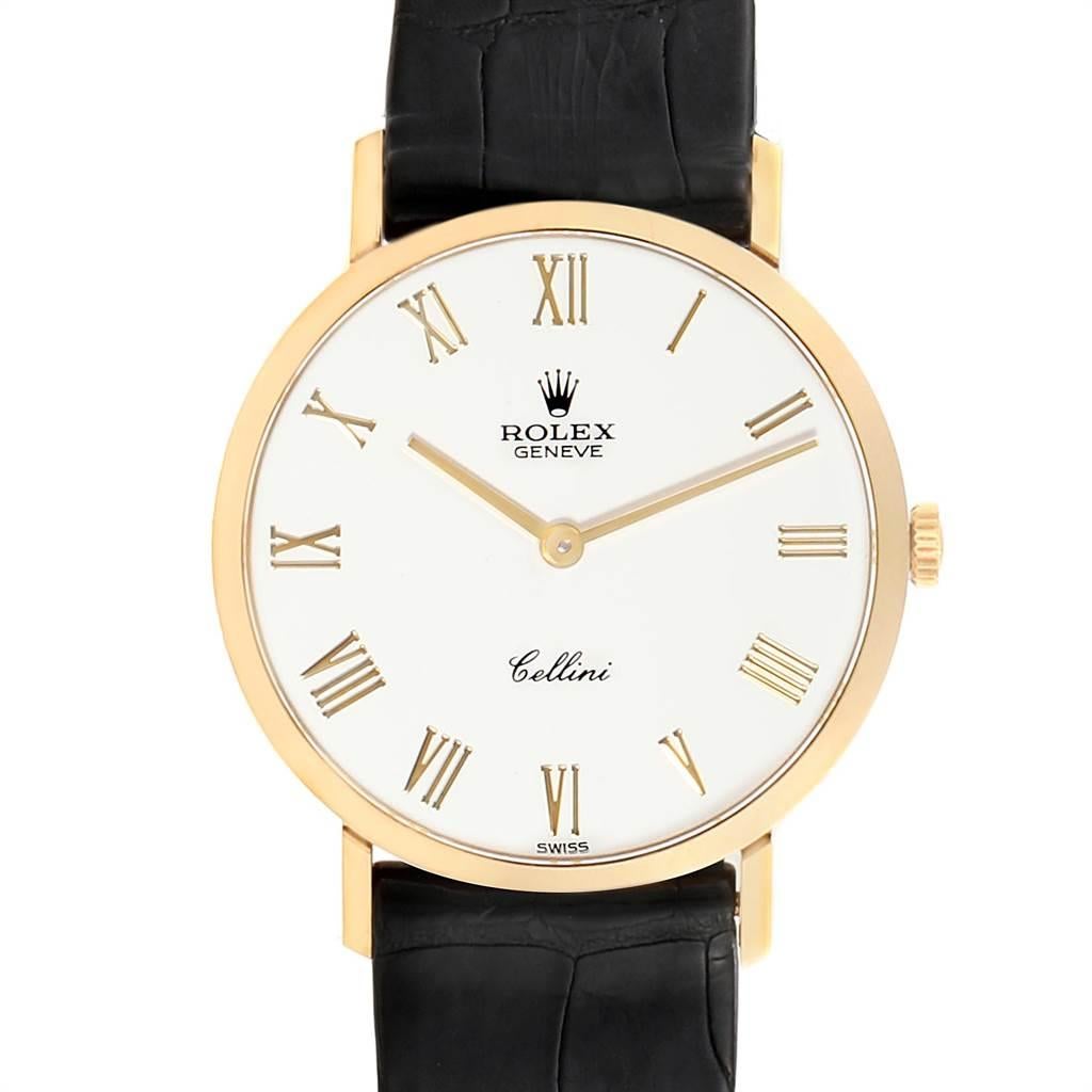 Rolex Cellini Classic Yellow Gold White Dial Mens Watch 4112 NOS. Manual winding movement. 18k yellow gold slim case 30.5 mm in diameter. Rolex logo on a crown. Scratch resistant sapphire crystal. Flat profile. White dial with raised gold roman