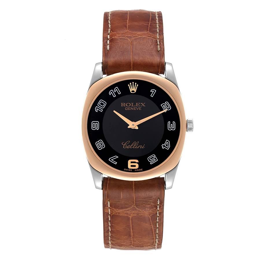 Rolex Cellini Danaos Black Dial White Gold Rose Gold Brown Strap Mens Watch 4233. Manual winding movement. 18k white and rose gold rounded rectangular case 33.0 mm in diameter. Rolex logo on the crown. 18k rose gold smooth bezel. Scratch resistant