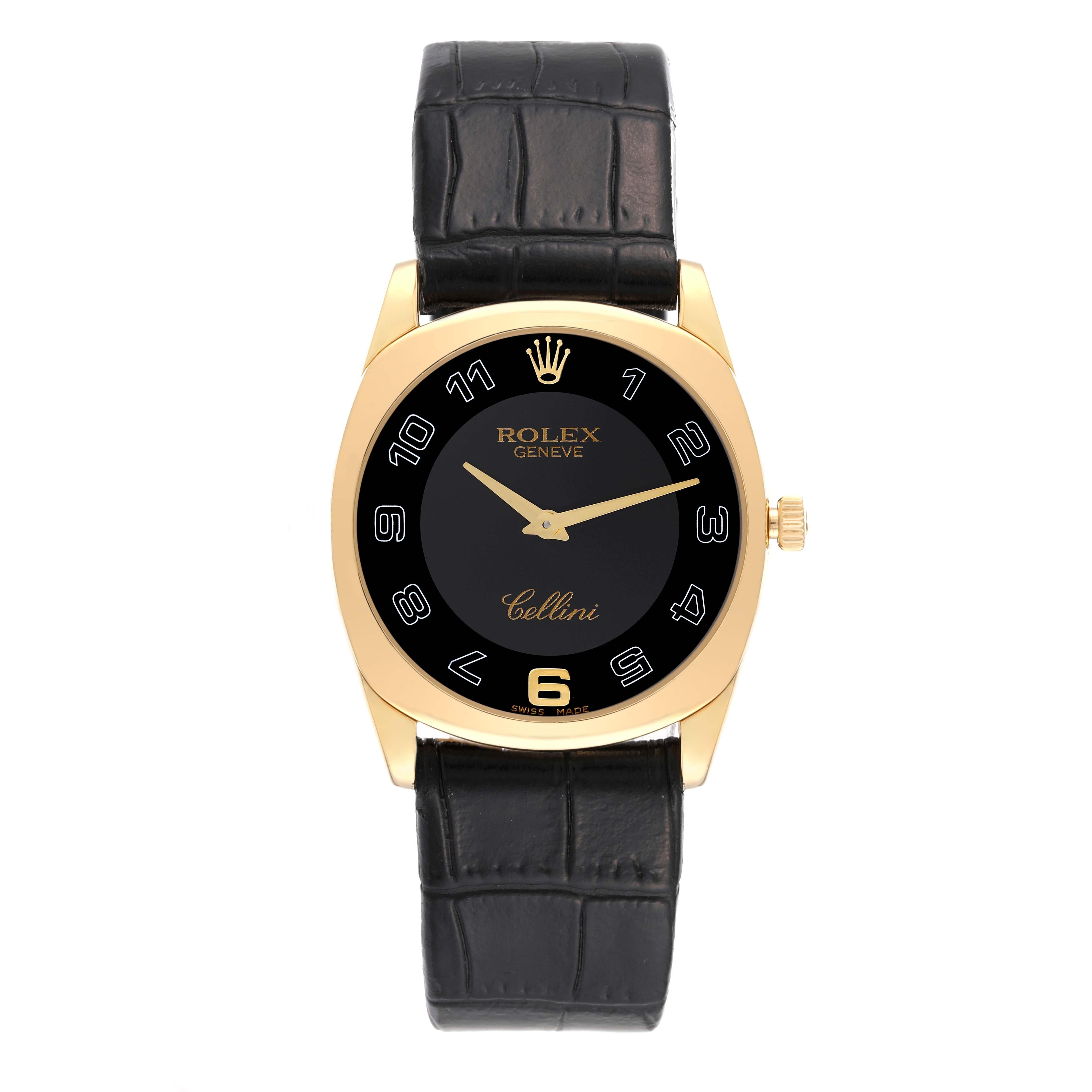 Rolex Cellini Danaos Yellow Gold Black Strap Mens Watch 4233 Card. Manual winding movement. 18k yellow gold cushion shaped case 34.0 mm. Rolex logo on a crown. . Scratch resistant sapphire crystal. Black dial with oversized Arabic numerals. Raised