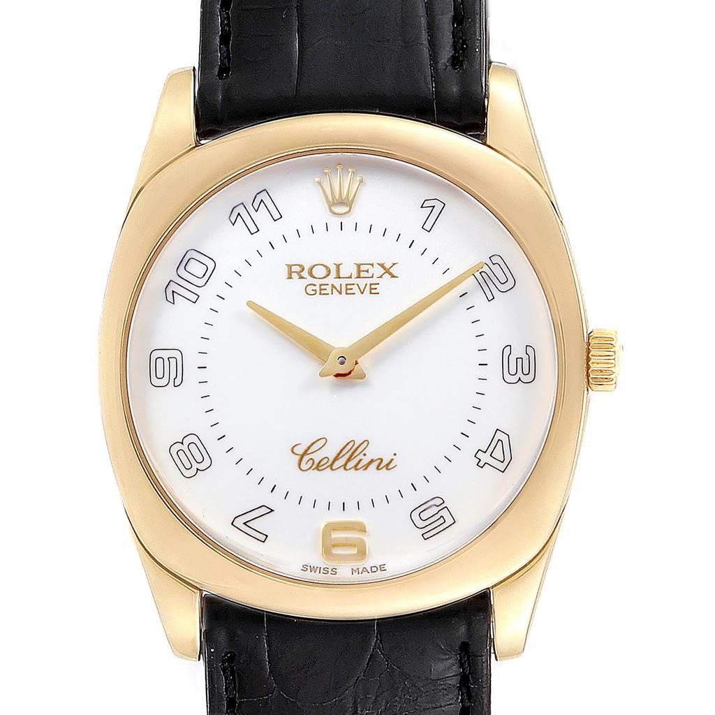 Rolex Cellini Danaos Yellow Gold Black Strap Mens Watch 4233. Manual winding movement. 18k yellow gold rounded rectangular case 34 mm. Rolex logo on a crown. Scratch resistant sapphire crystal. White dial with oversized arabic numerals. Black