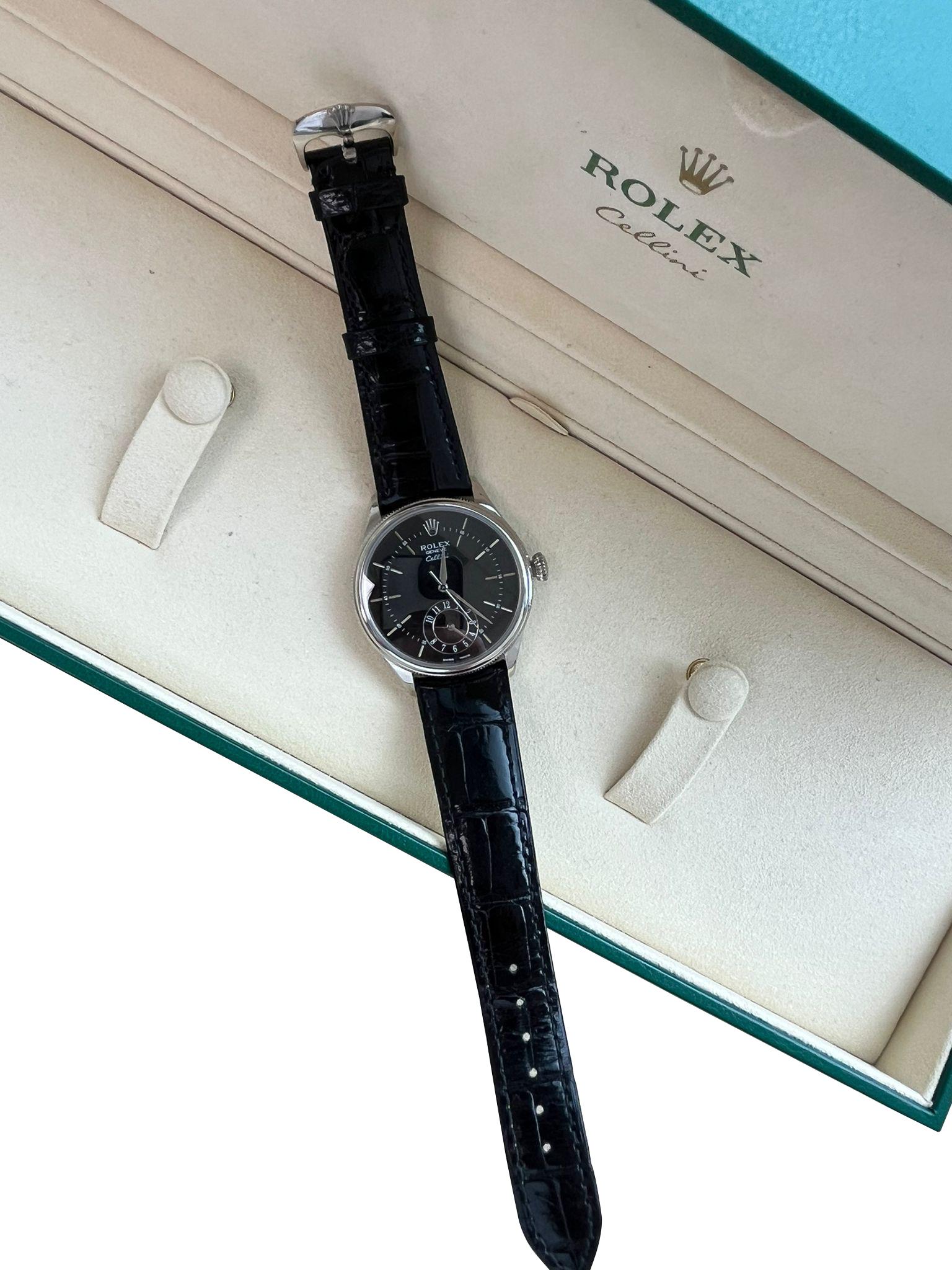 Rolex Cellini Dual Time White Gold Black Dial Automatic Mens Watch 50529. Automatic self-winding movement. Officially certified Swiss chronometer (COSC). Bidirectional self-winding via Perpetual rotor. 18K white gold round case 39 mm in diameter.