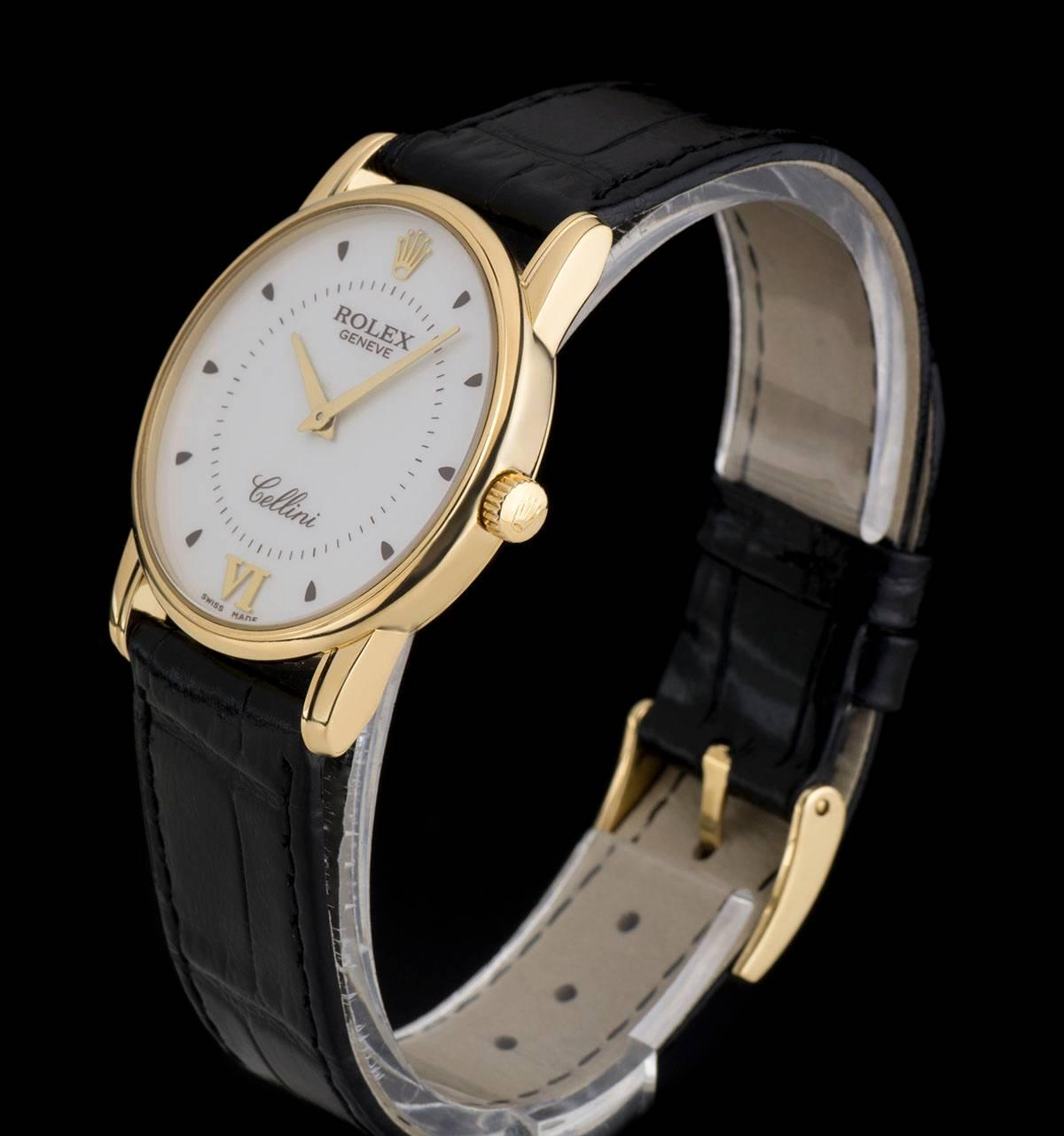 An 18k Yellow Gold Cellini Gents Wristwatch, silver dial with hour markers and an applied roman numeral at 