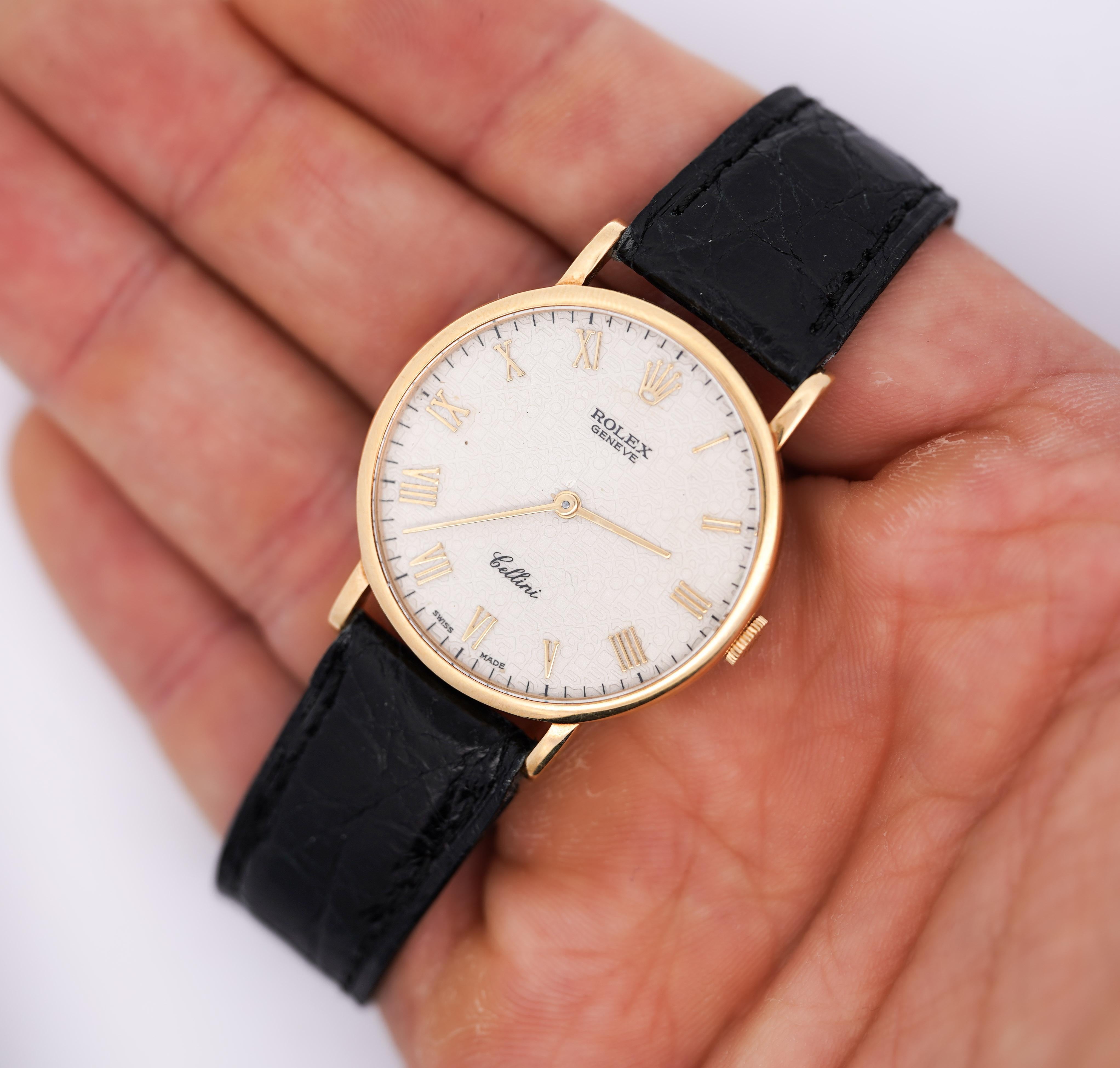 Vintage Rolex Cellini 5112 Handaufzugsuhr 18K Gelbgold 32mm rundes Gehäuse mit elfenbeinfarbenem Zifferblatt mit Jubiläumsmuster und römischen Ziffern. Komplett mit schwarzem, krokodilgeprägtem Lederarmband und original Rolex Dornschließe aus 18