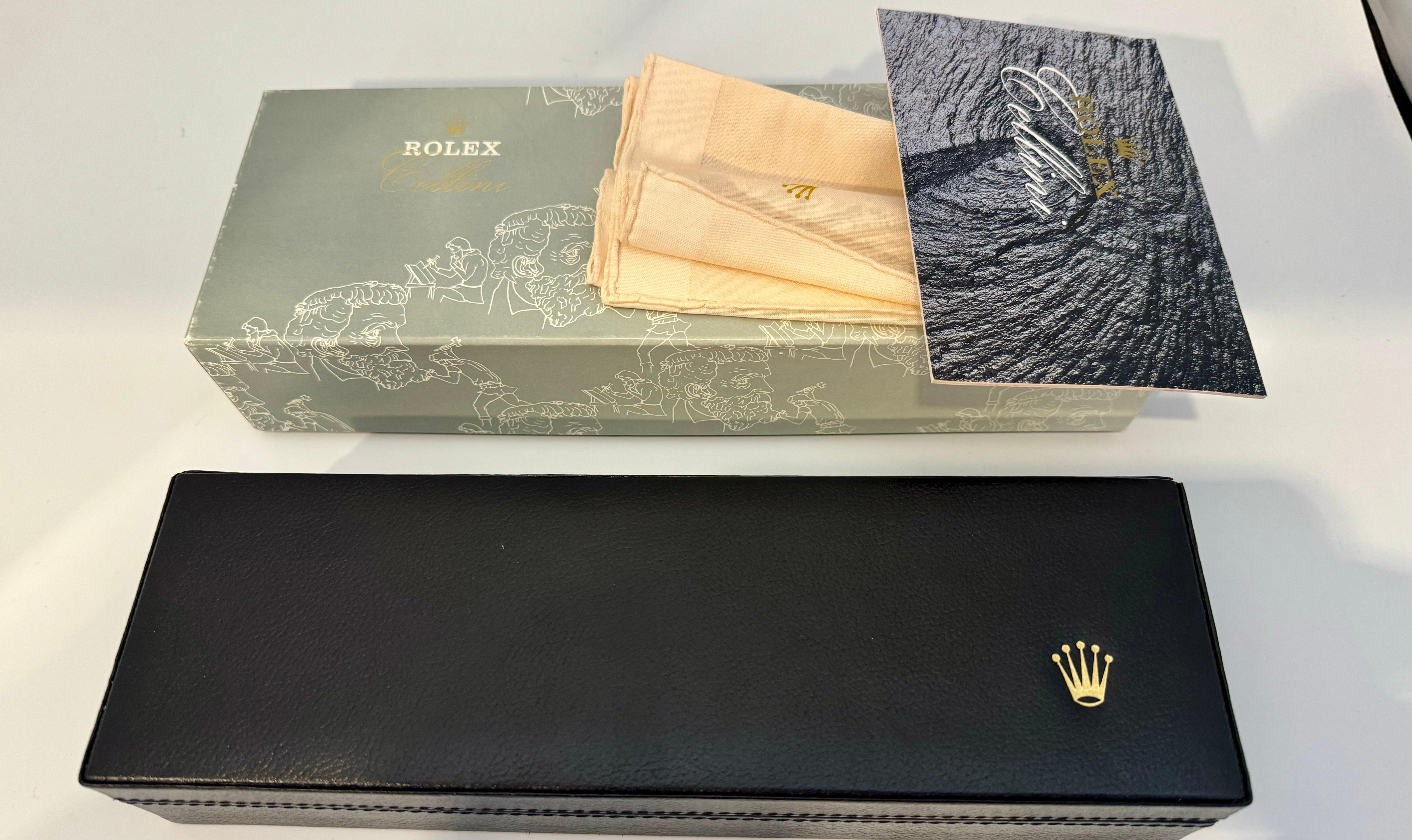 Rolex Cellini watch box complete with outer box. Black leather cream inside new In Excellent Condition In New York, NY