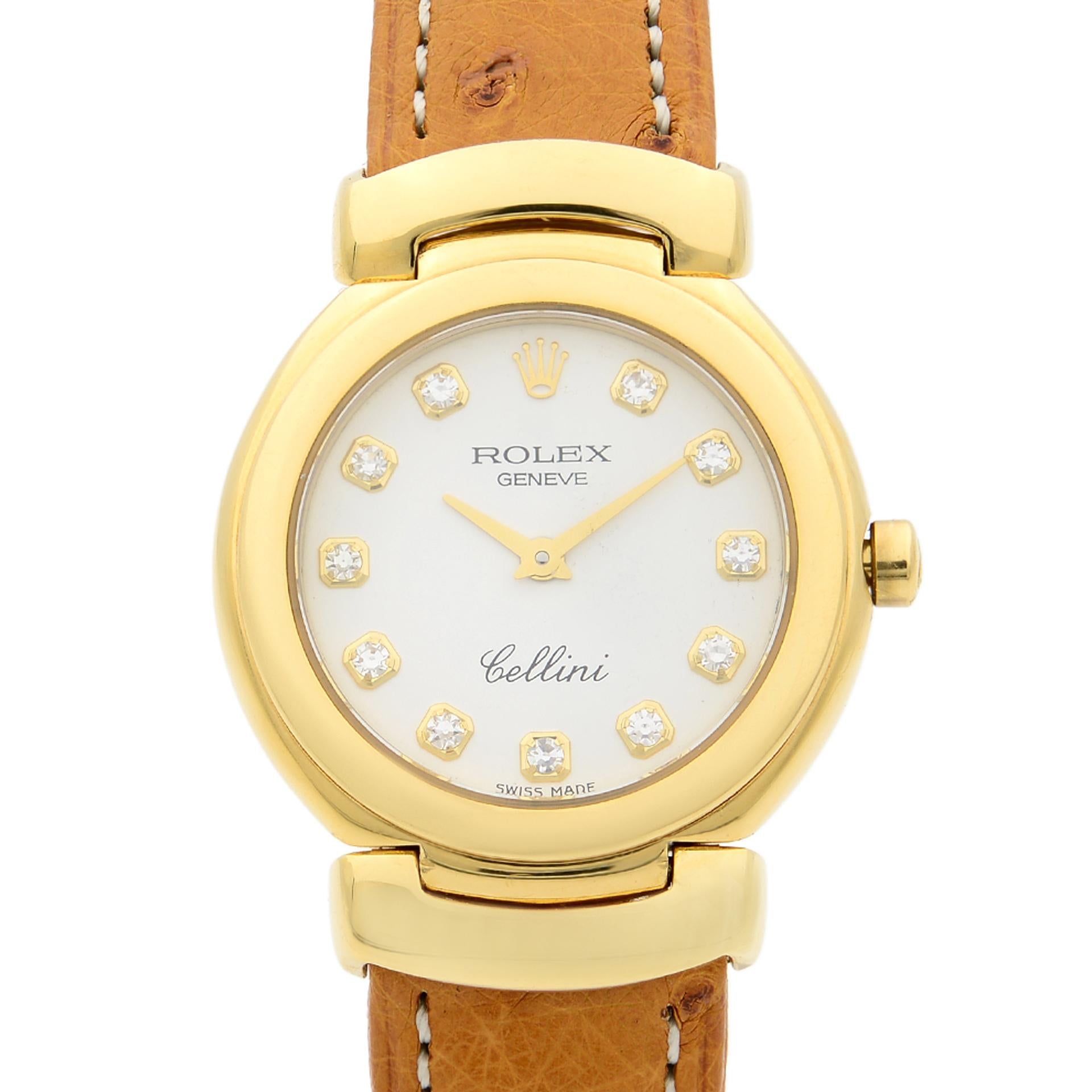 This pre-owned Rolex Cellini  6221 is a beautiful Ladie's timepiece that is powered by mechanical (automatic) movement which is cased in a yellow gold case. It has a round shape face,  dial and has hand diamonds style markers. It is completed with a