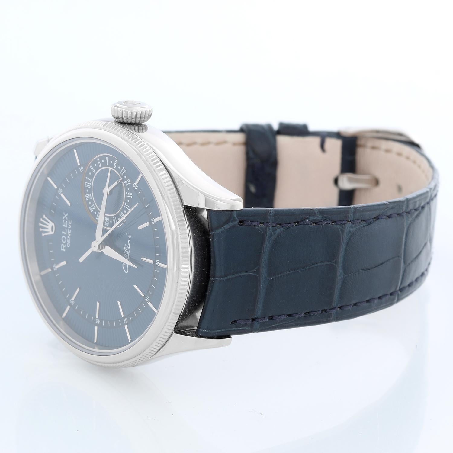 Rolex Cellini White Gold Mens Dress Watch Ref 50519 - Automatic. 18K White Gold ( 39 mm). Blue dial with stick hour markers. Black Rolex Leather Strap with Rolex white gold tang buckle . Pre-owned with Rolex box and Tag.