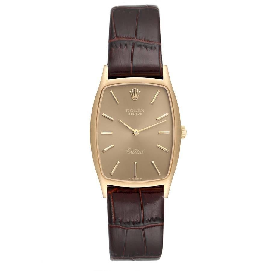 Rolex Cellini Yellow Gold Champagne Dial Vintage Ladies Watch 3807. Manual winding movement. 18k yellow gold tonneau shaped case 26.0 x 37.0 mm. Rolex logo on a crown. . Mineral glass crystal. Champagne dial with gold baton hour markers and hands.