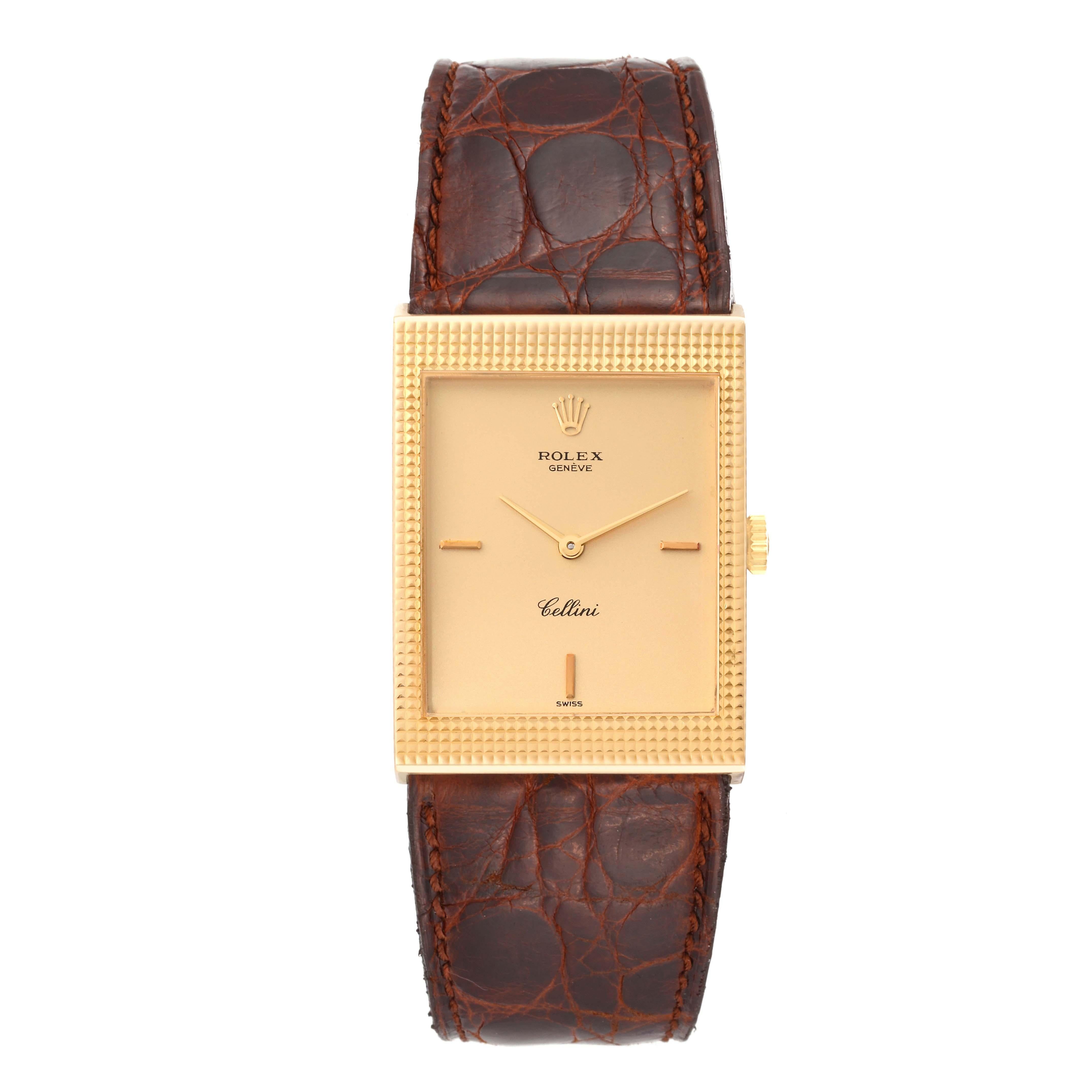 Rolex Cellini Yellow Gold Champagne Dial Vintage Mens Watch 4127. Manual winding movement. 18k yellow gold  rectangular case 24.0 x 33.0 mm. Rolex logo on a crown. Hooded lugs. . Mineral glass crystal. Champagne dial with yellow gold baton hour