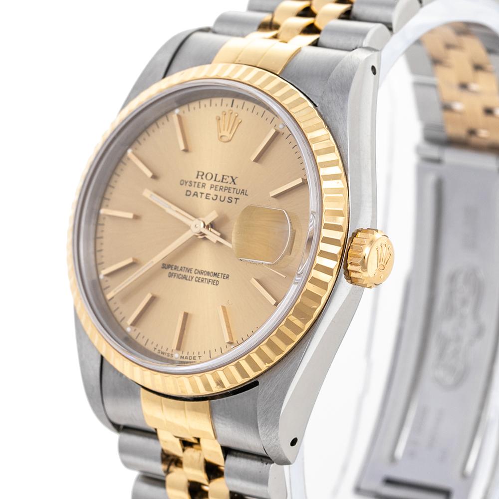 Datejust watches, first introduced in 1945, are one of the most recognizable and much-coveted watches from the house Rolex. This watch features a distinctive champagne dial with index hour markers, three hands, and a date window at three o'clock