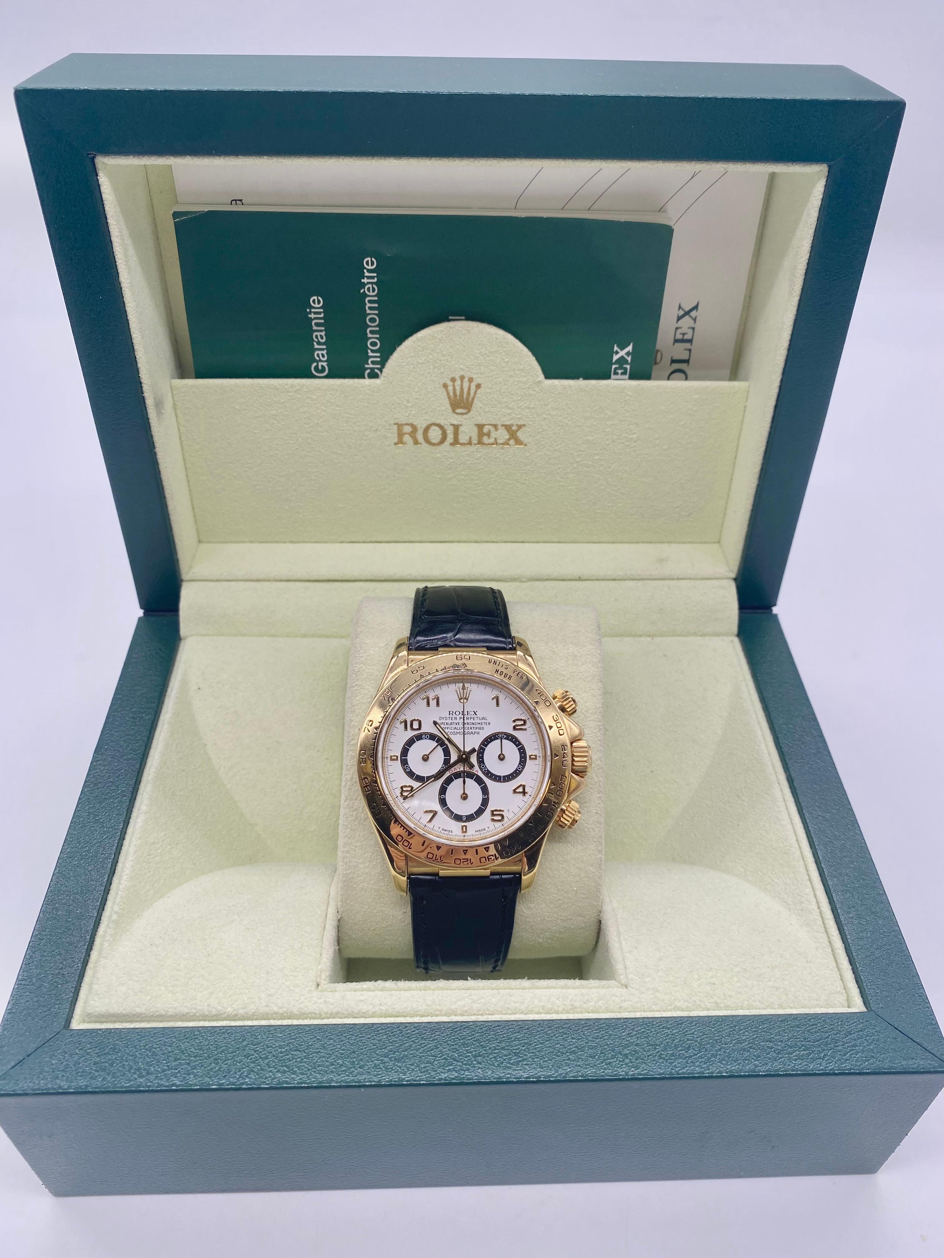 Rolex Daytona in 18 Carat yellow gold surrounded by a crocodile skin strap. It comes with an authentic box. Quality pre-owned Rolex watch.

The Certified Pre-Owned Rolex Daytona Sport watch is crafted in 18k yellow gold on a crocodile strap 18K