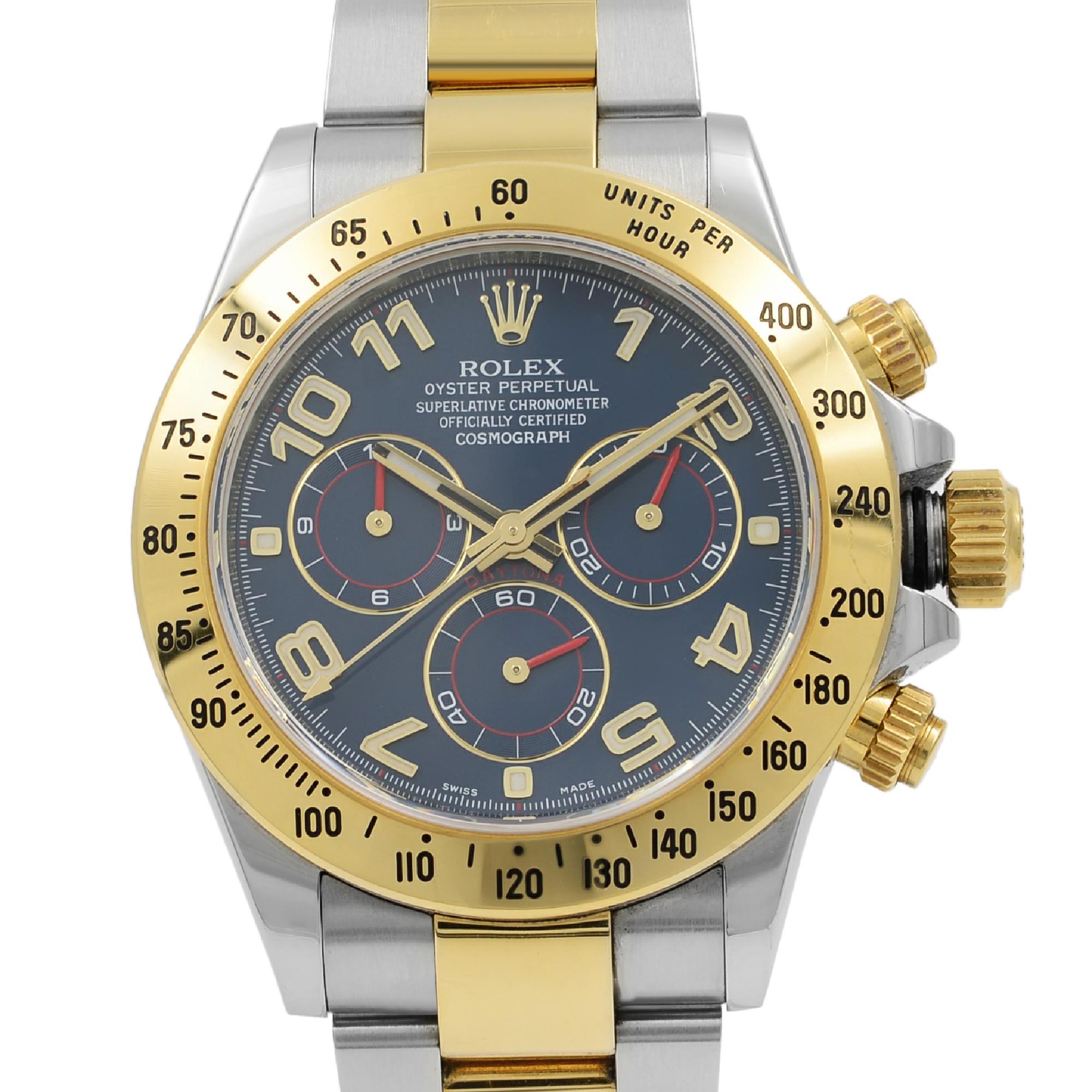 Pre-owned Rolex Cosmograph Daytona 18K Yellow Gold Stainless Steel Blue Racing Dial Automatic Men's Watch 116523.  V-series. The card is dated 2010. This Watch Comes With an Original Box and Papers. Covered by 1-year Chronostore Warranty.