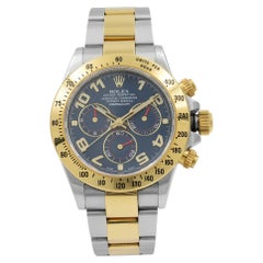 Montre Rolex Cosmograph Daytona en or jaune 18 carats:: cadran bleu de course:: pour hommes 116523