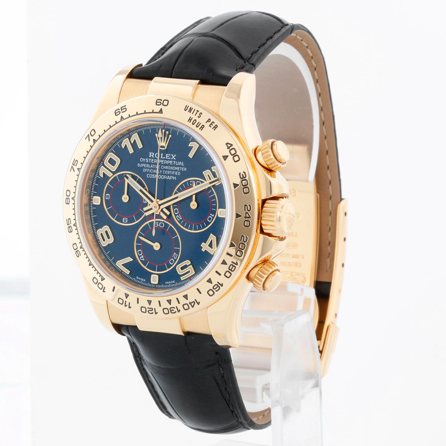 Rolex Cosmograph Daytona Men's 18k Yellow Gold Watch 116518 - Automatic winding, chronograph, 44 jewels, sapphire crystal. 18k yellow gold case and bezel with stickers. Blue racing dial. Rolex black leather strap with 18k yellow gold deployant