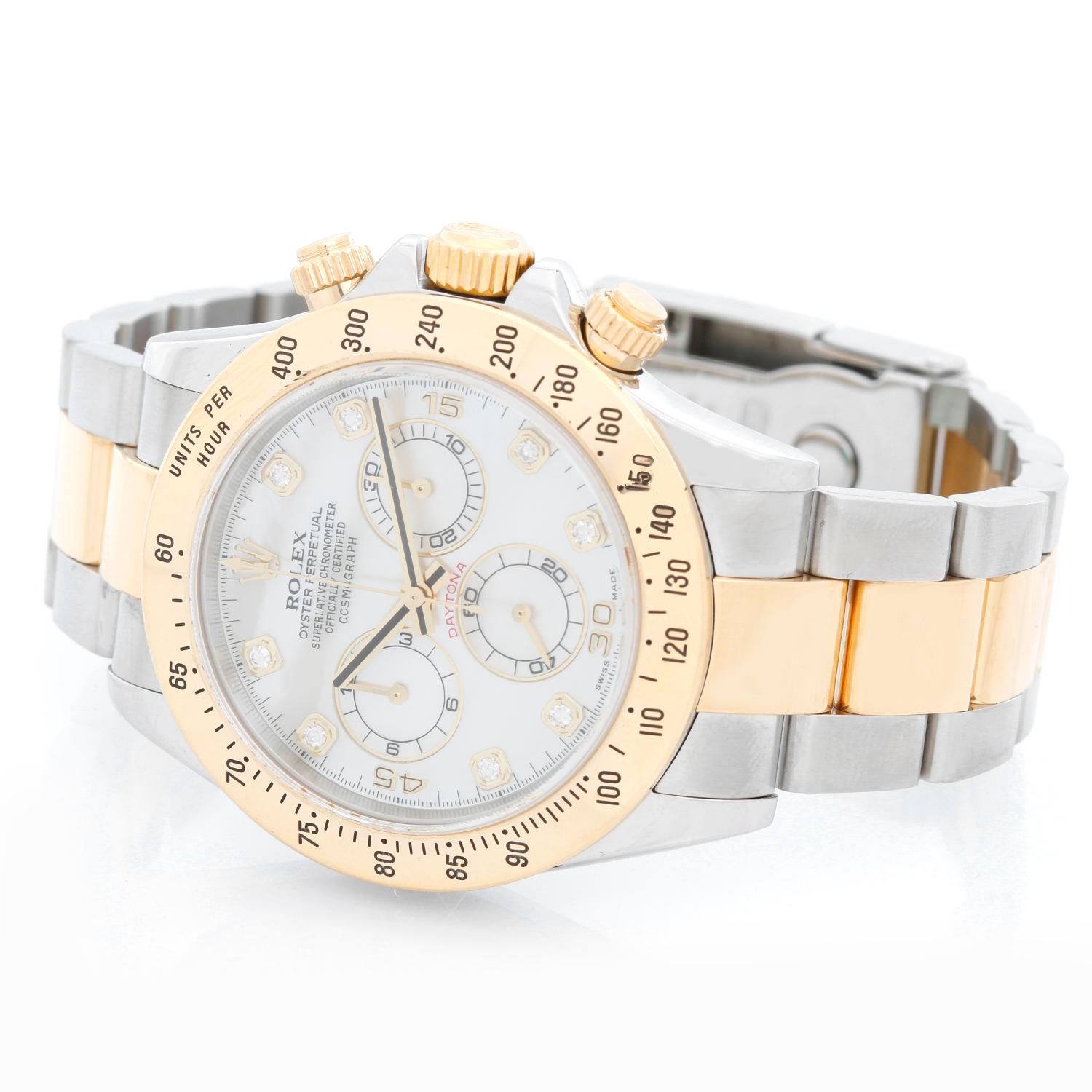 Rolex Cosmograph Daytona Men's Watch 116523 - Automatic winding, chronograph, 44 jewels, sapphire crystal. Stainless steel case with 18k yellow gold bezel ( 40 mm ). Rolex White Mother of Pearl with Diamonds . Stainless steel and 18k yellow gold