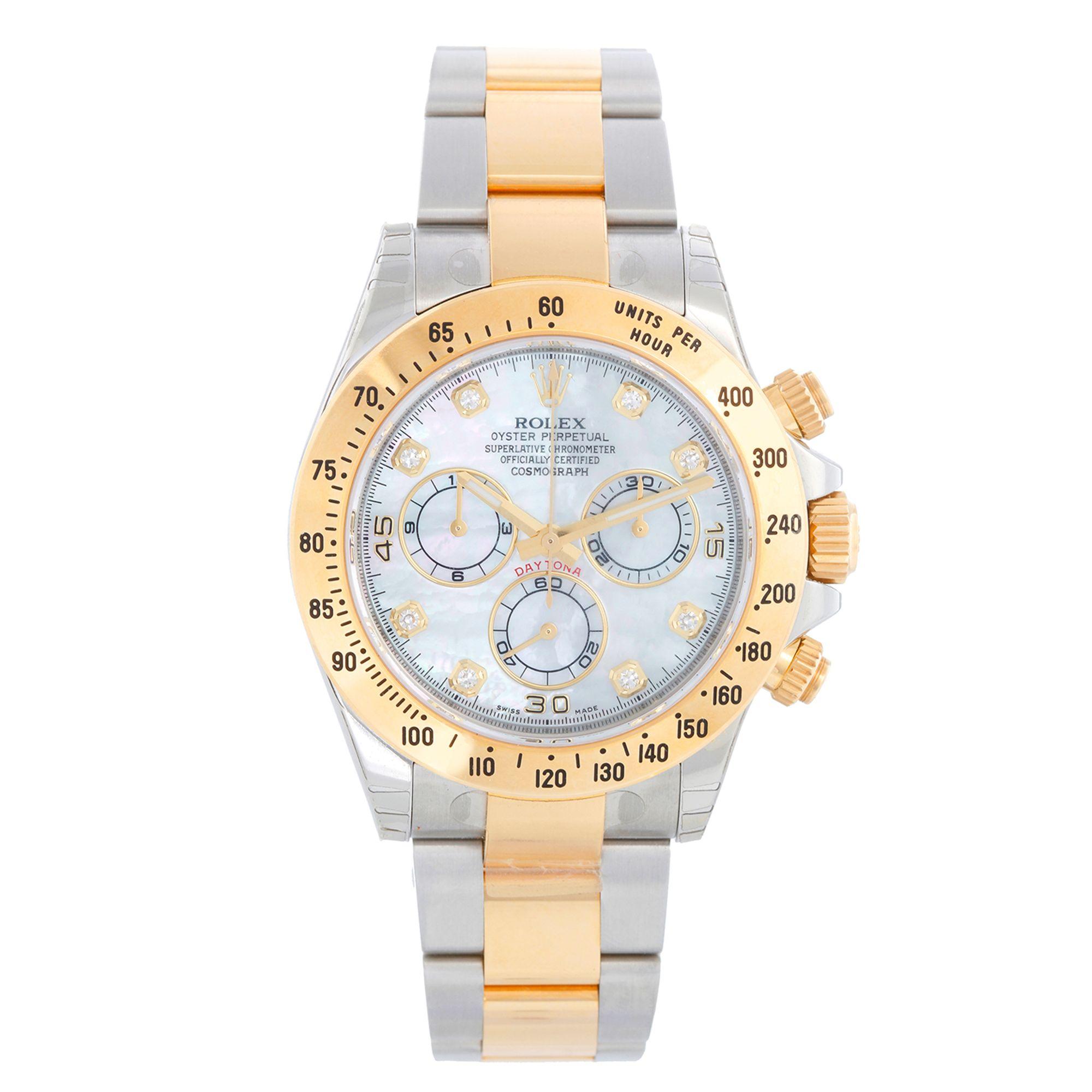 Rolex Cosmograph Daytona Men's Watch 116523 - Automatic winding, chronograph, 44 jewels, sapphire crystal. Stainless steel and 18k yellow gold; inner bezel engraving . Factory mother of pearl dial with diamond hour markers. Stainless steel and 18k