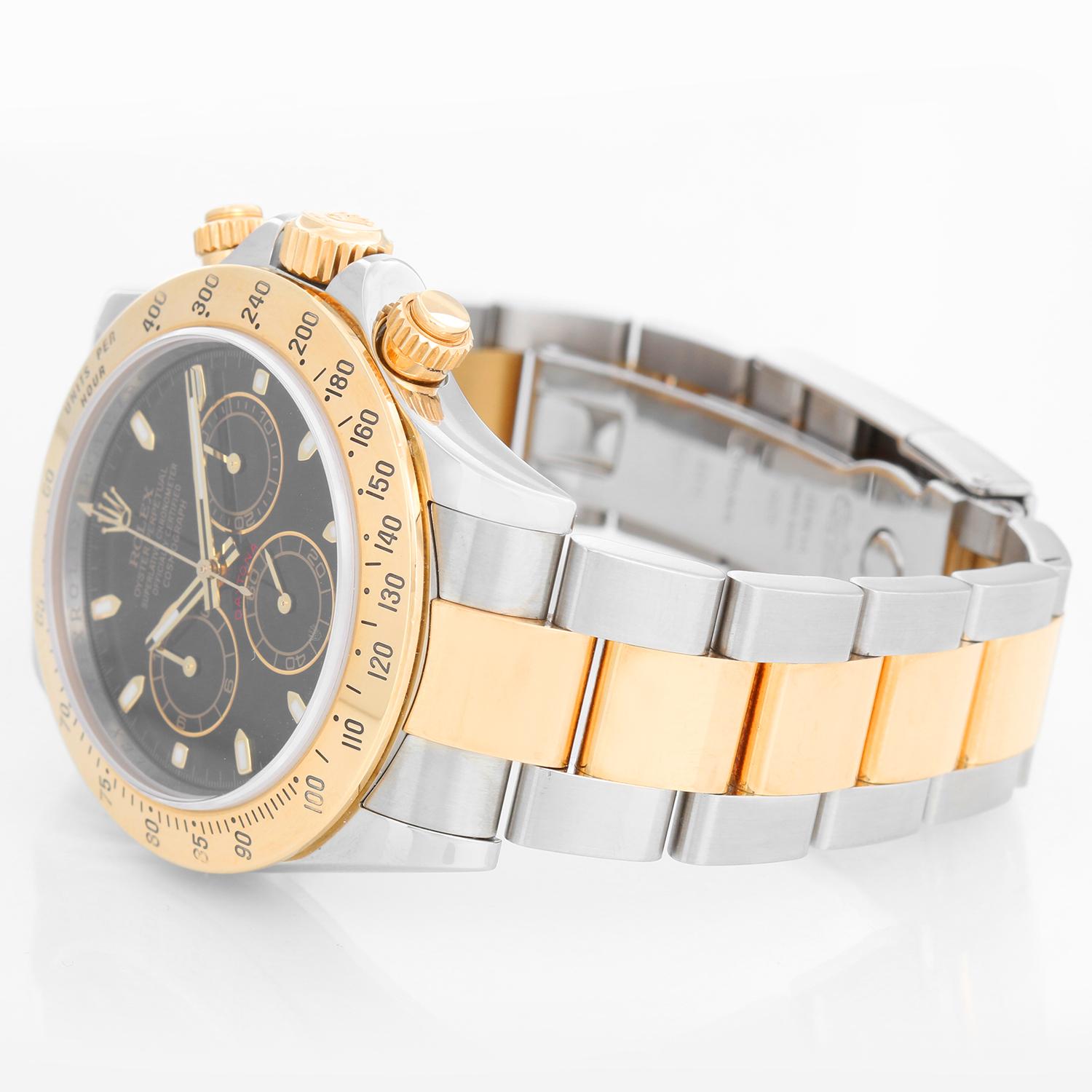 Rolex Cosmograph Daytona Men's Watch 116523 - Automatic winding, chronograph, 44 jewels, sapphire crystal. Stainless steel case with 18k yellow gold bezel. Black  dial with luminous-style markers. Stainless steel and 18k yellow gold Oyster bracelet