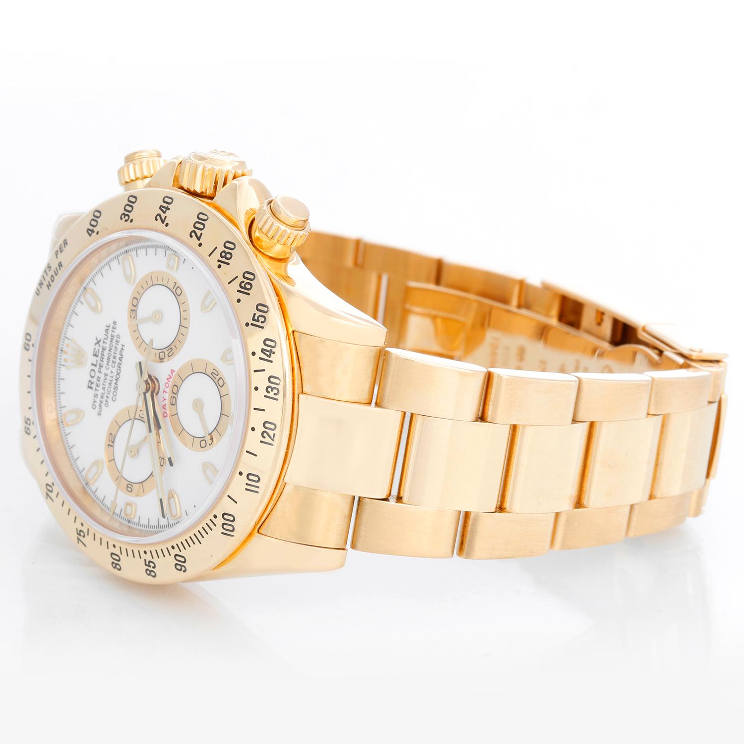 Rolex Cosmograph Daytona Men's Watch 116528 - Automatic winding, chronograph, 44 jewels, sapphire crystal. 18k yellow gold case (40 mm ). White dial with baton markers. 18k yellow gold Oyster bracelet with flip-lock clasp. Pre-owned with Rolex box,