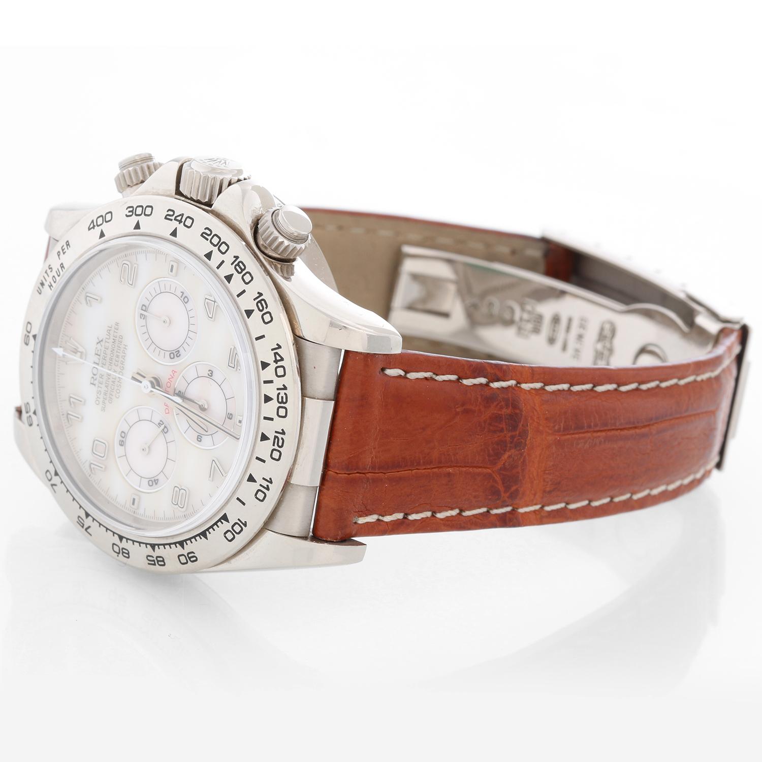 Rolex Cosmograph Daytona Men's White Gold Watch MOP Dial 16519 - Automatic winding, chronograph, 44 jewels, sapphire crystal. 18k white gold case and bezel (40mm diameter). Mother of pearl diamond dial. New Rolex Brown Strap with   Rolex 18k white