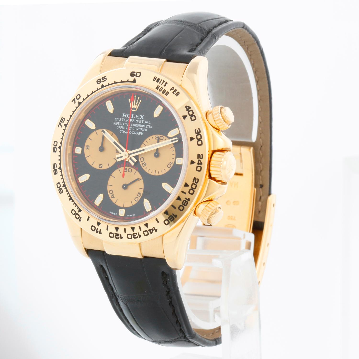 Rolex Cosmograph Daytona with Paul Newman dial Model 116518  - Automatic winding, chronograph, 44 jewels, sapphire crystal. 18k yellow gold case and bezel  (40mm diameter). Black dial with gold sub-dials. Black leather strap with black stitching and