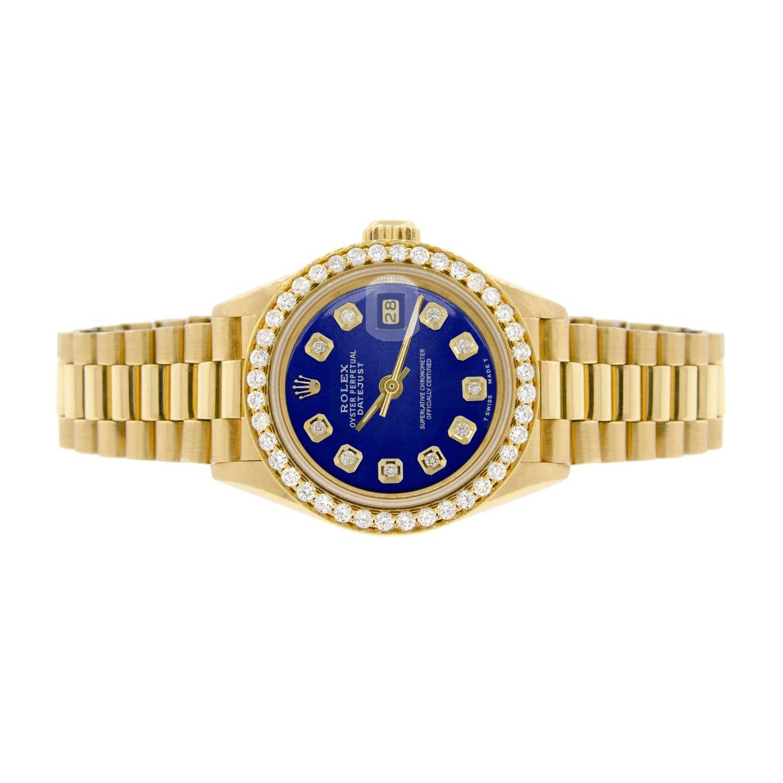 Rolex President Datejust Ladies Gold 26mm Watch Royal Blue Dial & Diamond Bezel  with 58 Diamonds set in 18 Karat Yellow Gold

This custom Rolex sure does stand out in the Royal Blue Colour  wit diamonds on the dial too.  Its jut the one  available 