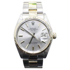 Rolex Date 1500 18 Karat Yellow Gold and Stainless Steel Silver Dial