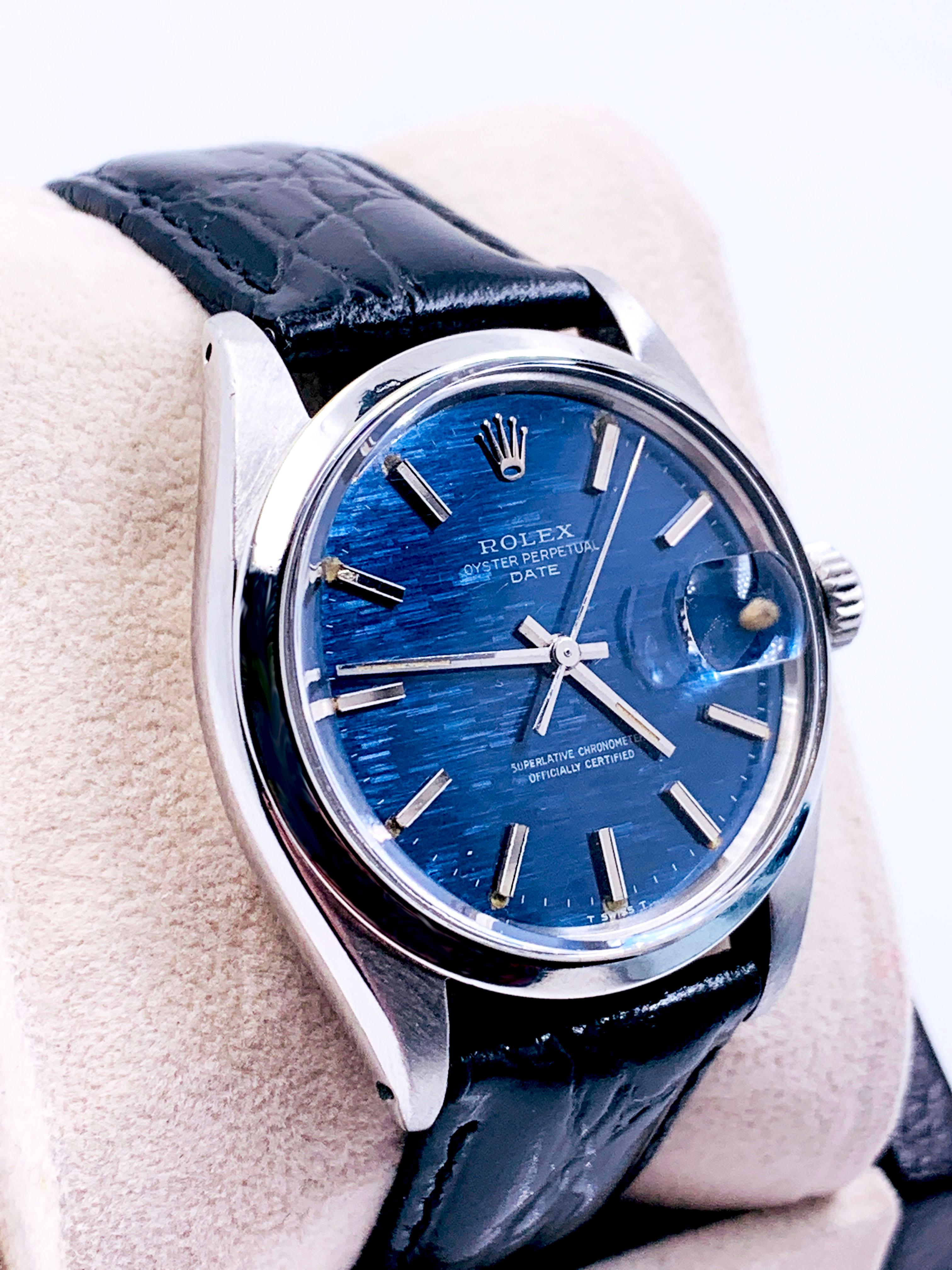 Style Number: 1500

 

Serial: 2531***

 

Model: Date

 

Case Material: Stainless Steel 

 

Band: Custom Black Leather Band 

 

Bezel: Stainless Steel 

 

Dial: Blue Mosaic (Shantung) 

 

Face: Acrylic 

 

Case Size: 34mm 

 

Includes: