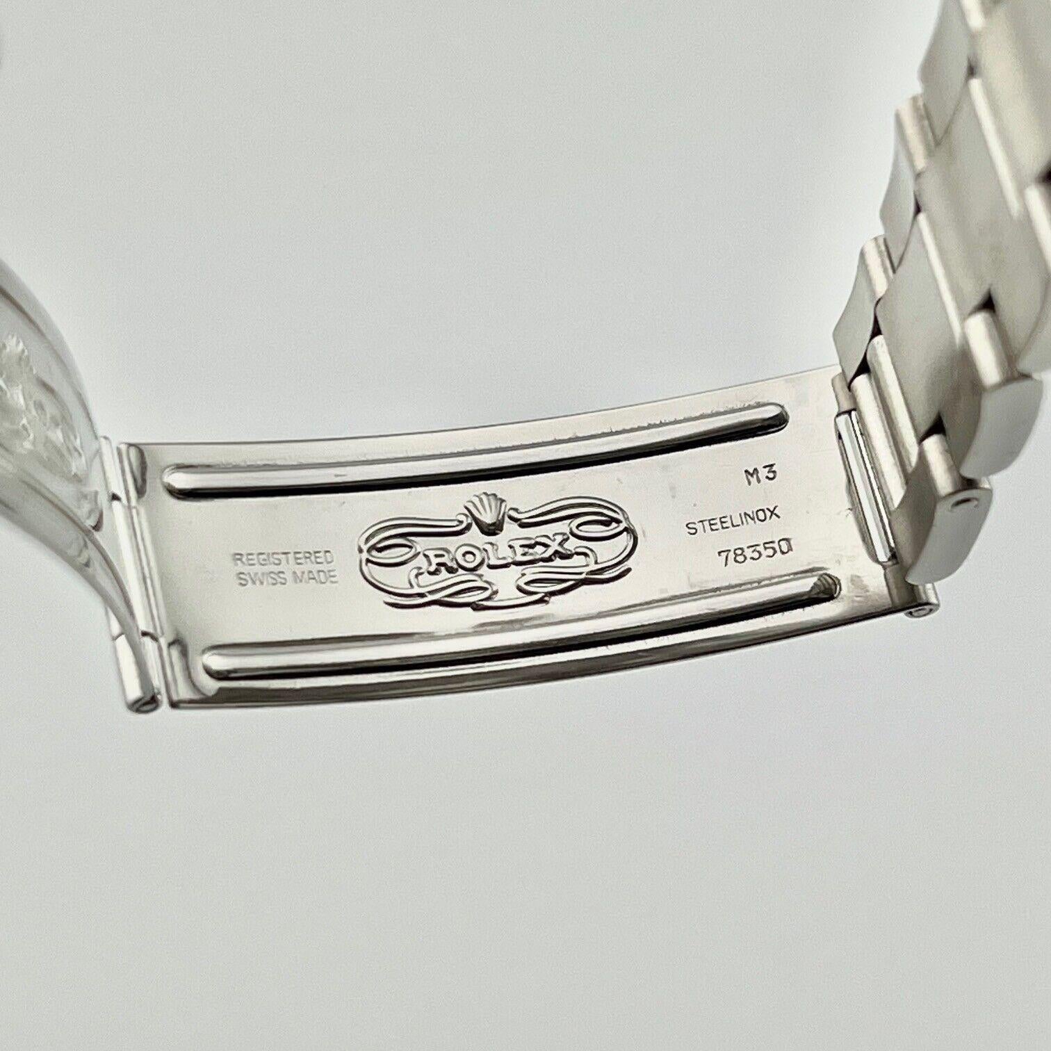 Rolex Date 15010 34mm Blue Dial Stainless Steel Engine-Turned Bezel Box Paper In Excellent Condition For Sale In San Diego, CA