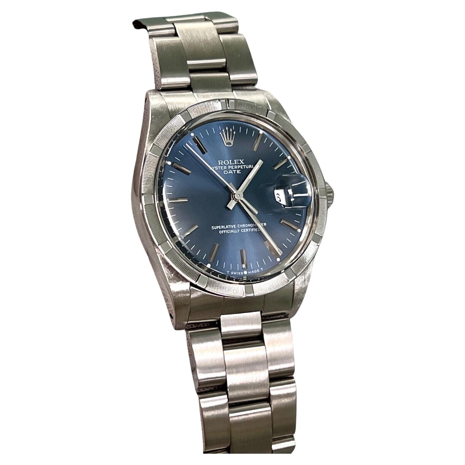Rolex Date 15010 34mm Blue Dial Stainless Steel Engine-Turned Bezel Box Paper