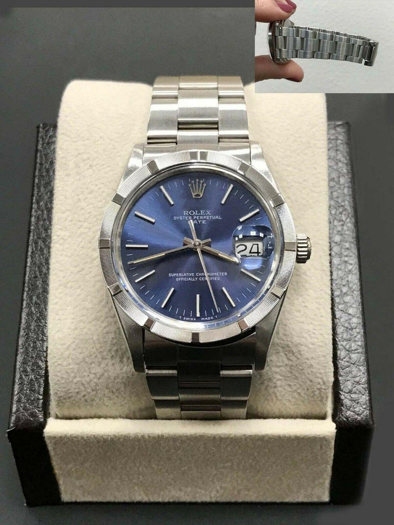 Rolex Date 15010 Blue Index Dial Stainless Steel Engine Turned Bezel