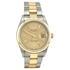 Rolex Date 15203 34mm Champagner-Zifferblatt 18K Gelbgold Edelstahl